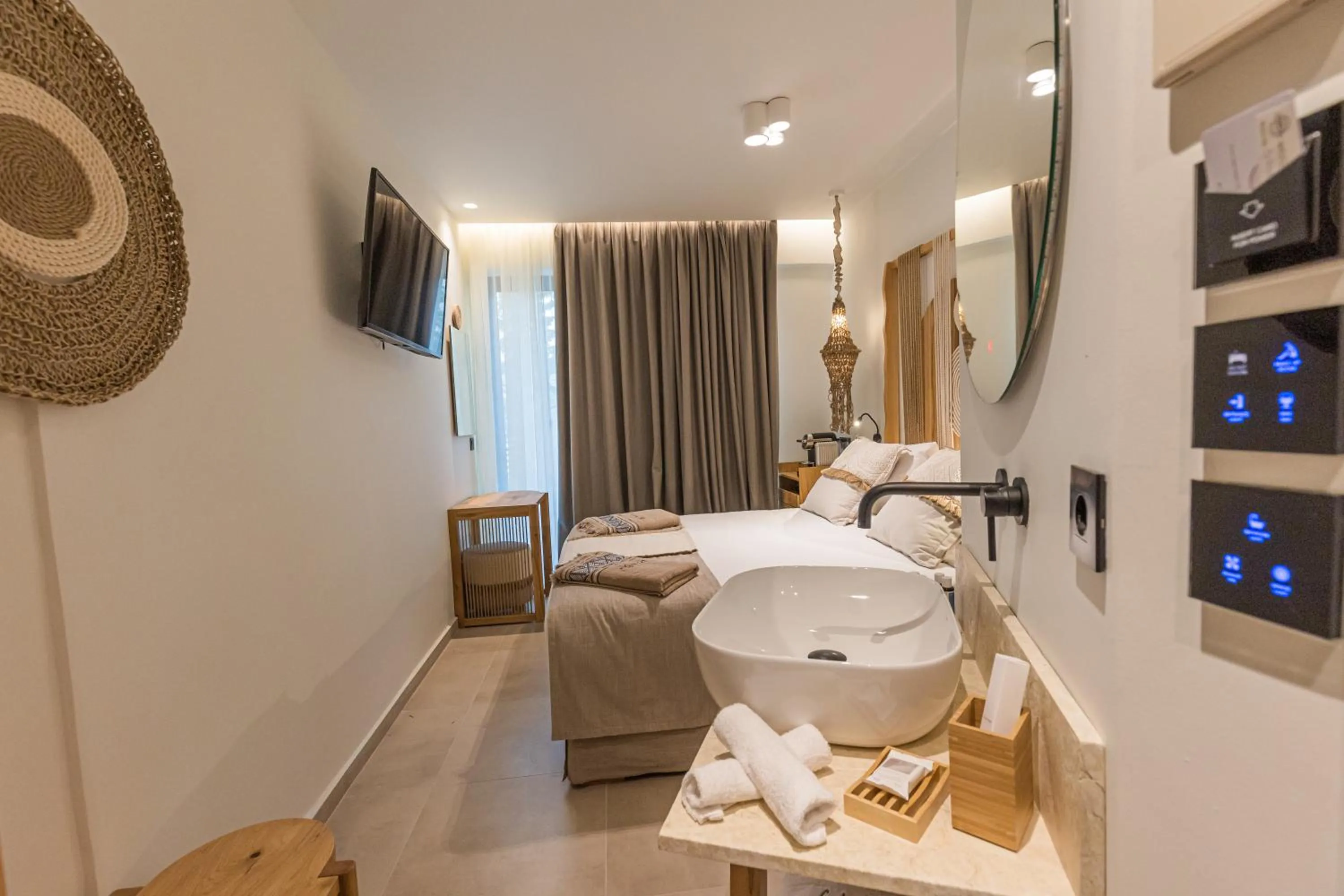 Bed in Cabana Blu Hotel & Suites