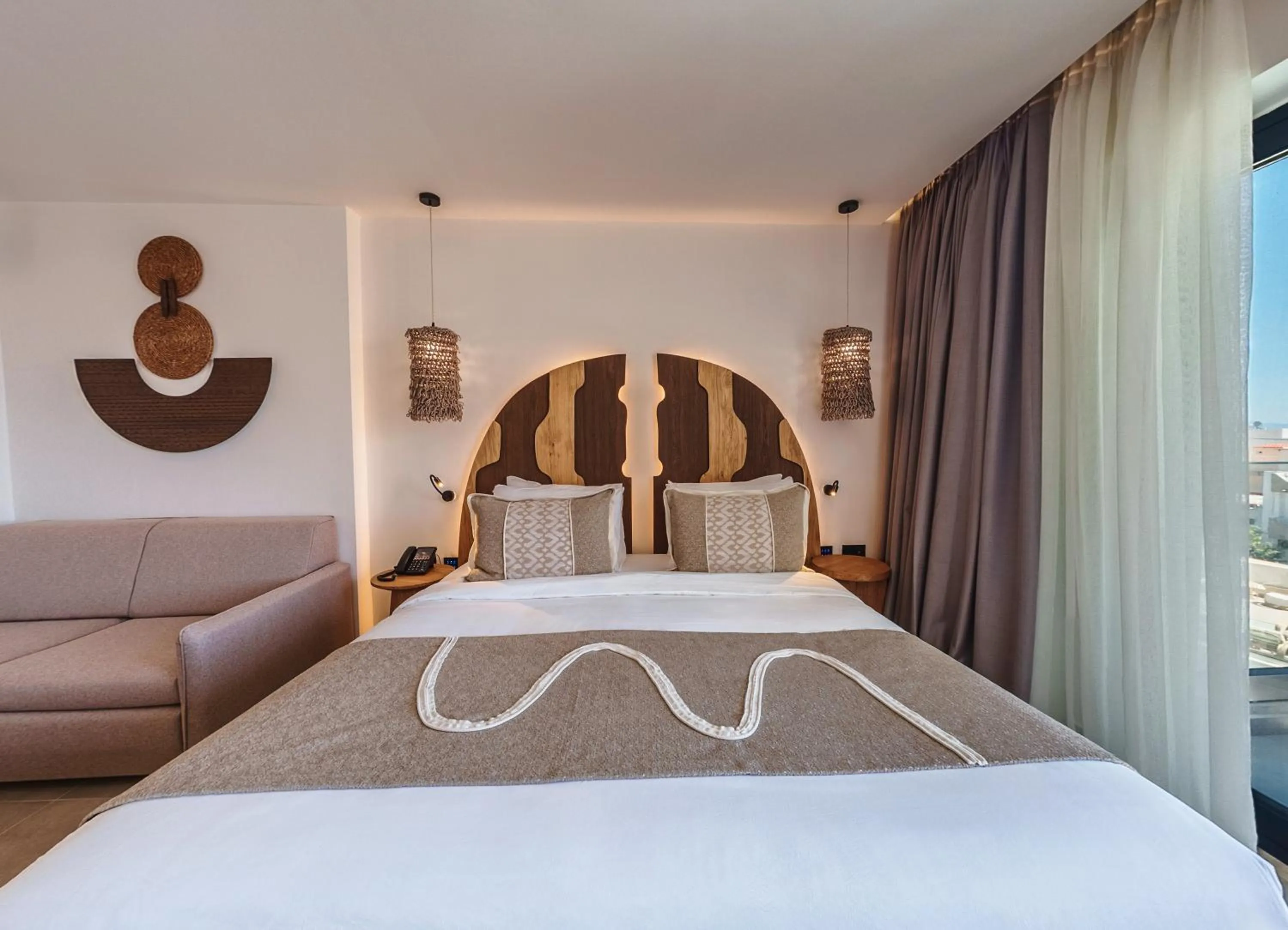 Bed in Cabana Blu Hotel & Suites