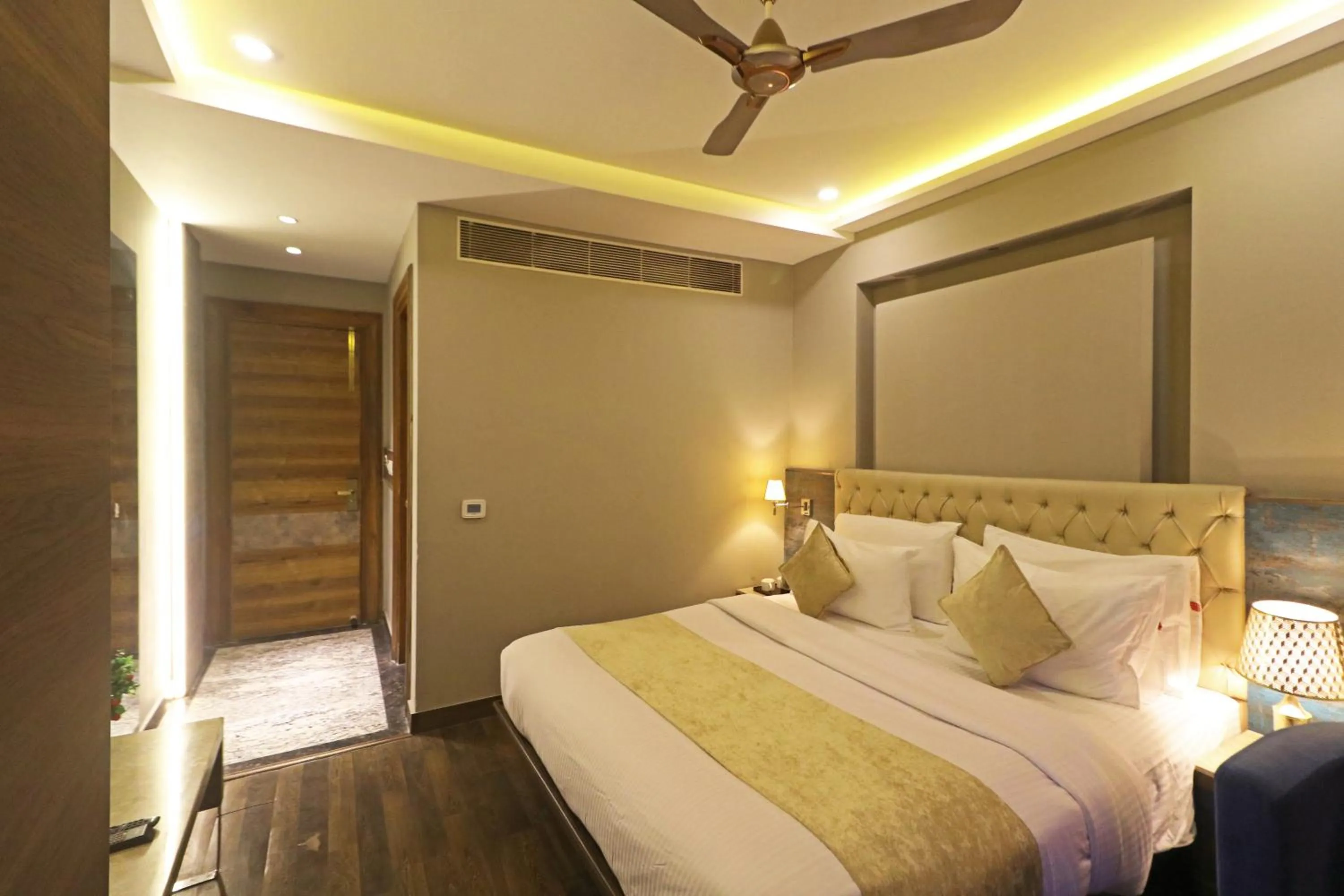 Photo of the whole room, Bed in The IVY Grand Hotel - 5 Minutes from Connaught Place and New Delhi Railway Station With Free Secured Parking