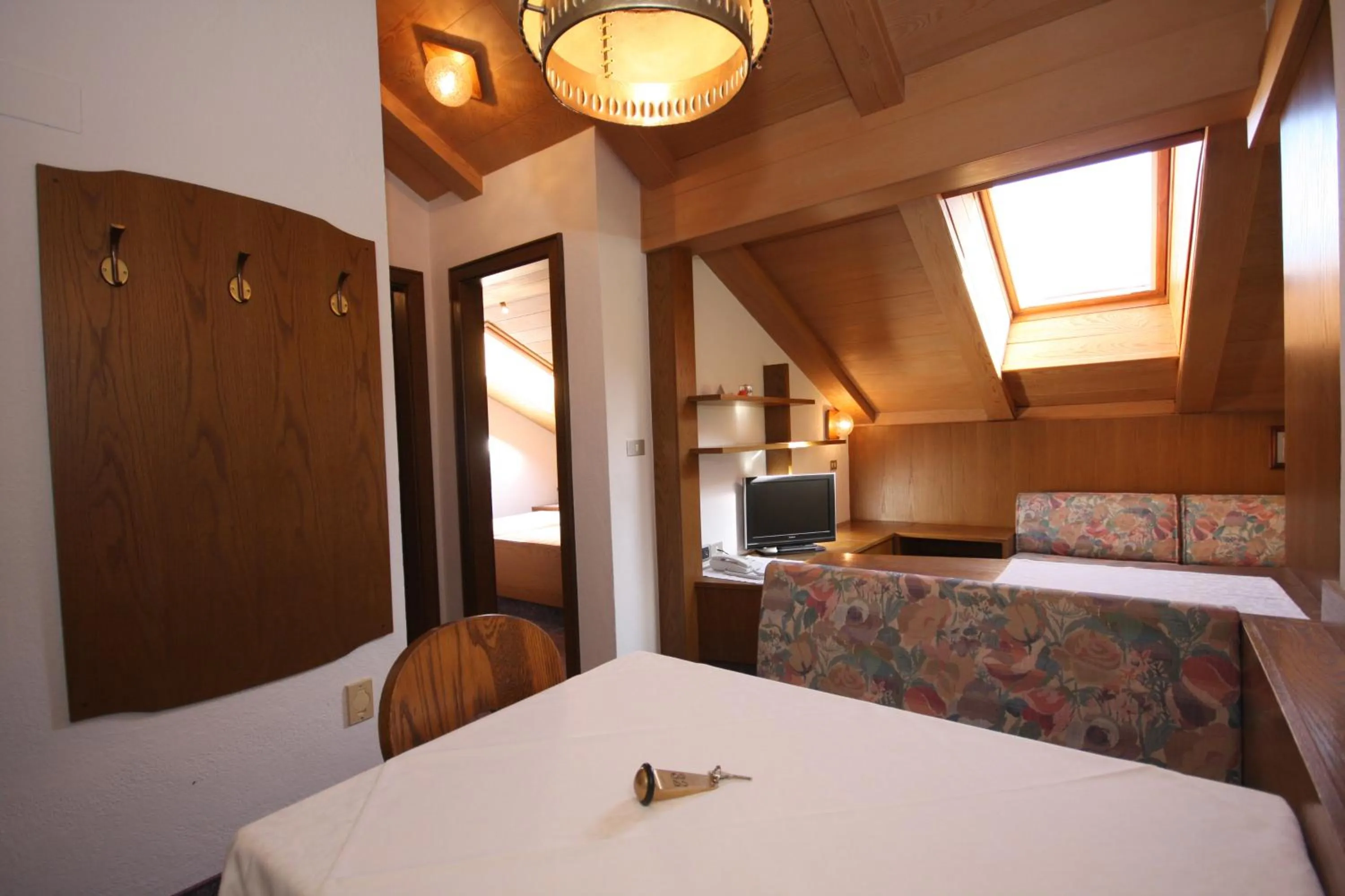 Living room, Bed in Apartments Residence Alta Badia
