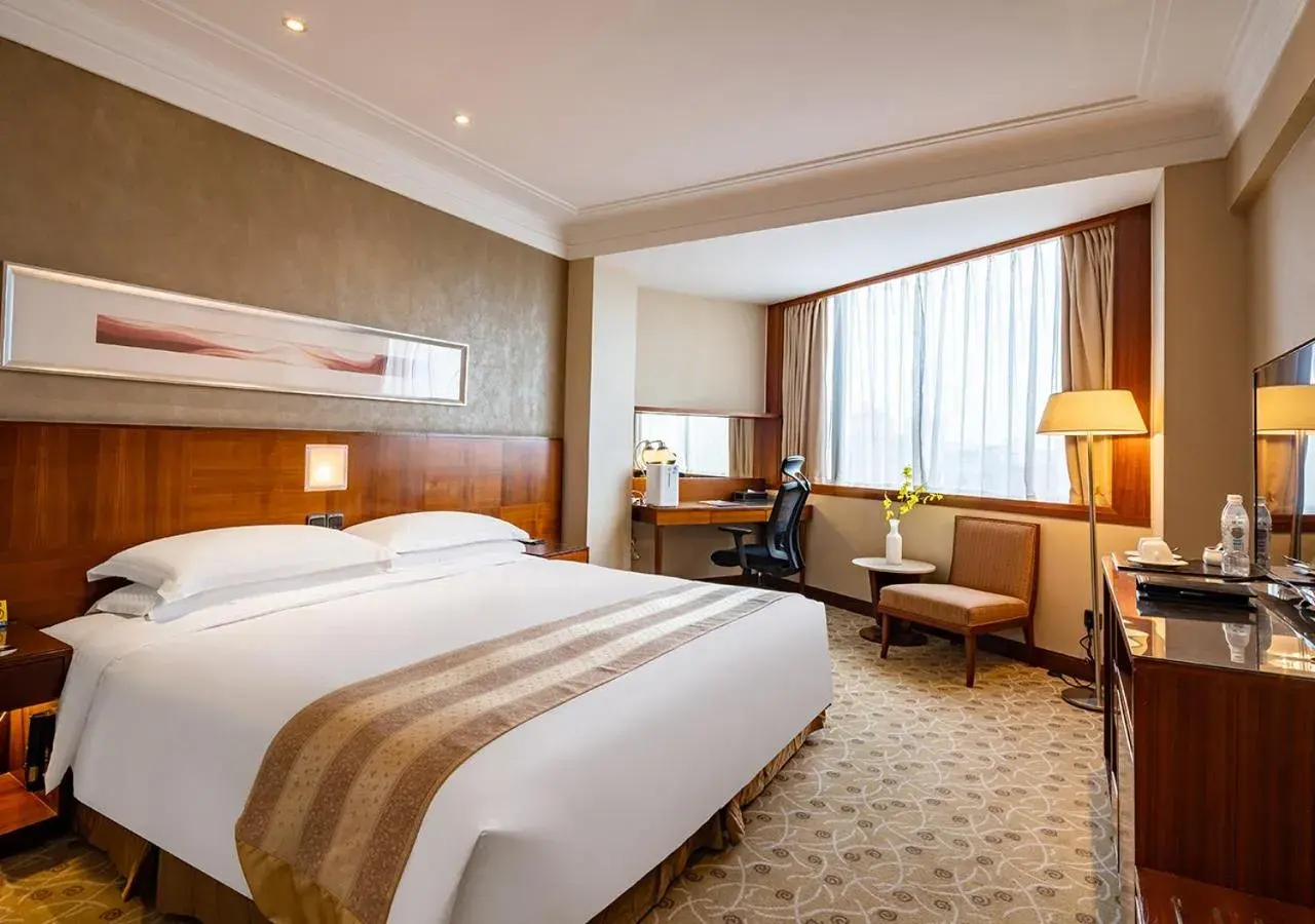 Photo of the whole room, Bed in San Want Hotel Shanghai Photo of the whole room, Bed in San Want Hotel Shanghai