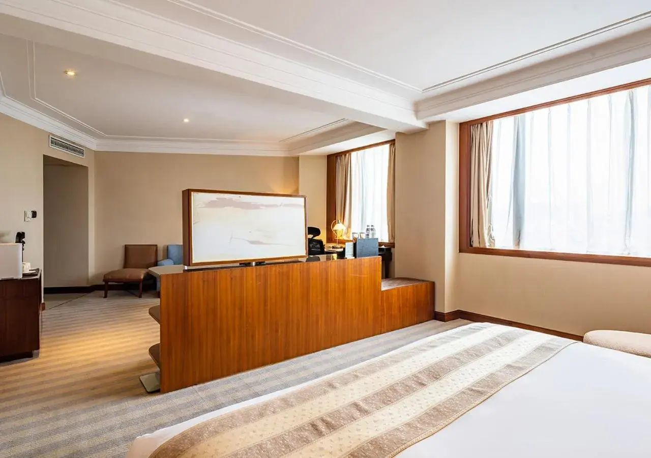 Photo of the whole room, Bed in San Want Hotel Shanghai Photo of the whole room, Bed in San Want Hotel Shanghai