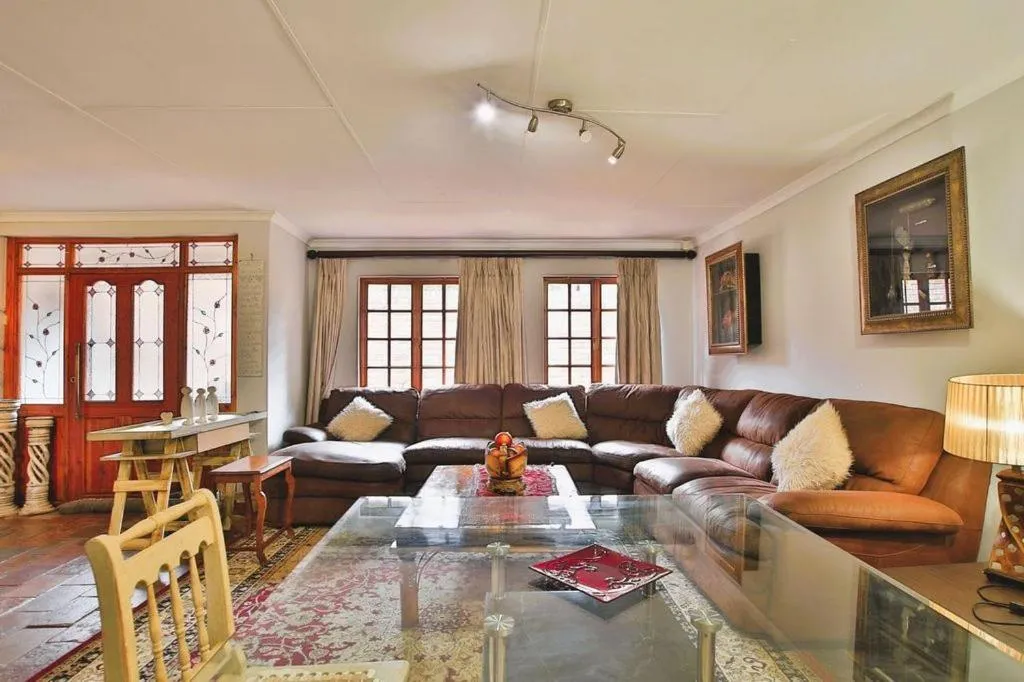 Communal lounge/ TV room in Mereke Manor