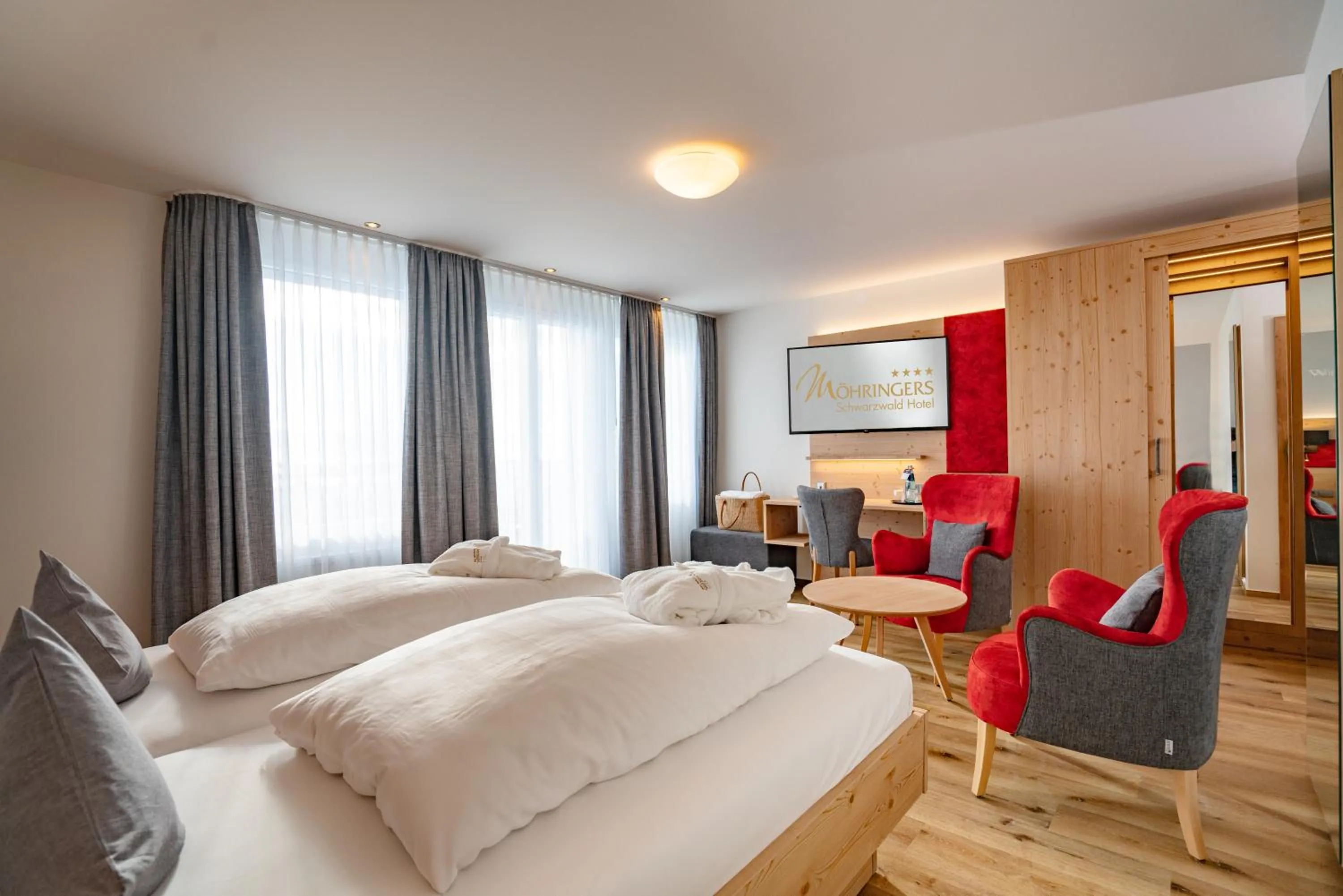 Photo of the whole room, Bed in Möhringers Schwarzwald Hotel