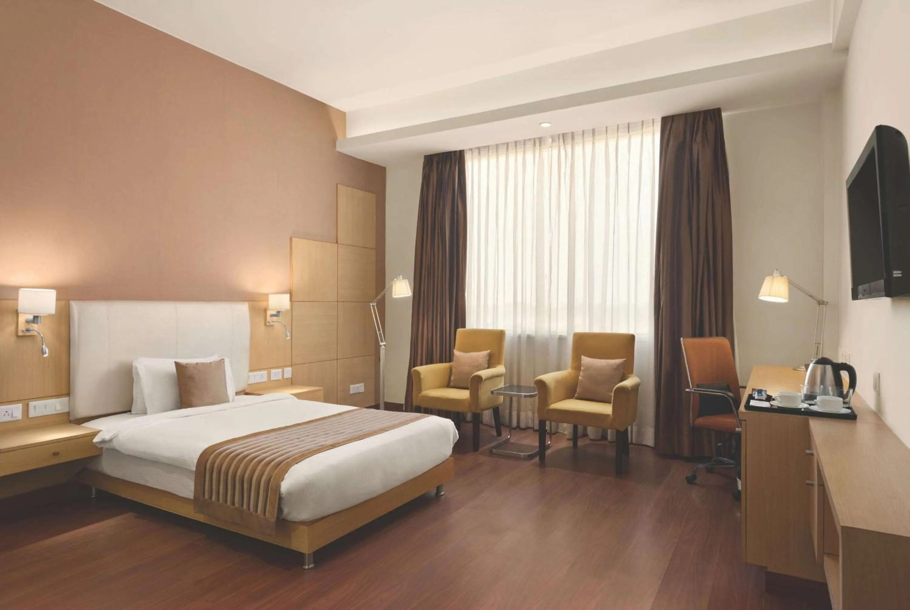 Photo of the whole room, Bed in Ramada Neemrana