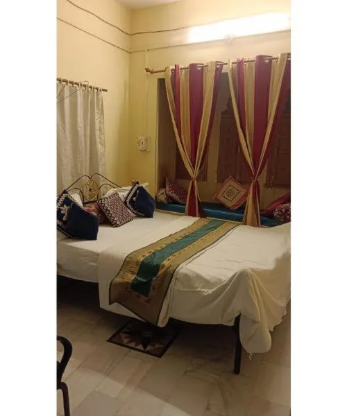 Bed in Hotel Neem Haveli
