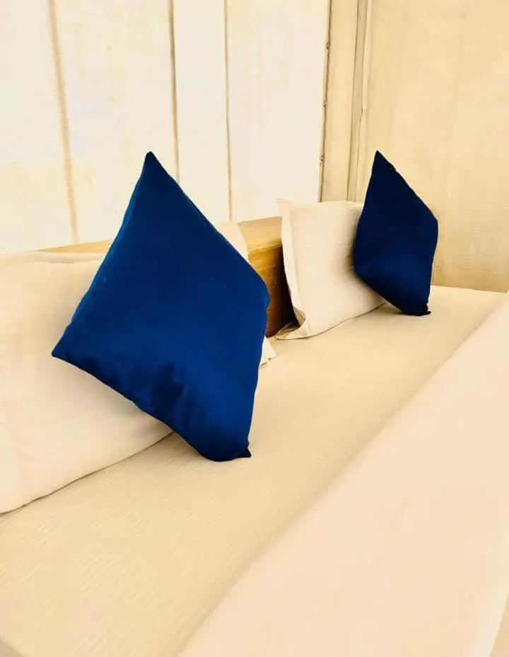 Bed in Hotel Neem Haveli