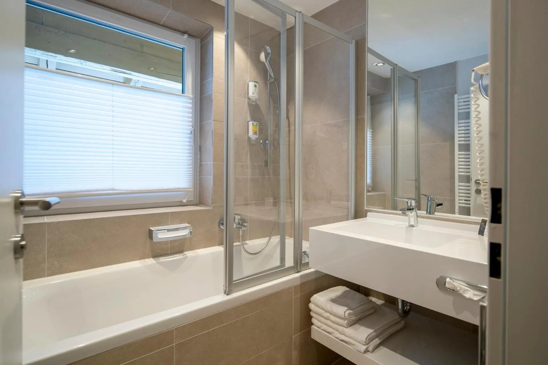 Bathroom in Familienhotel Felsenhof
