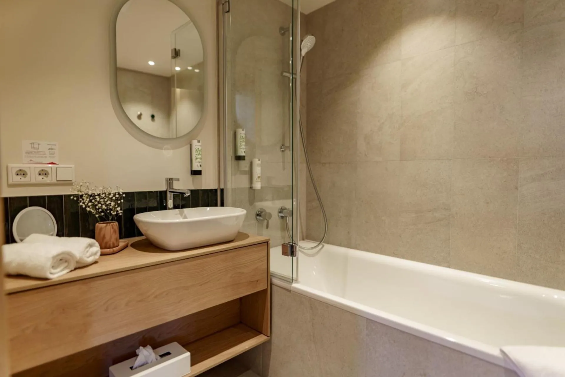 Bathroom in Familienhotel Felsenhof