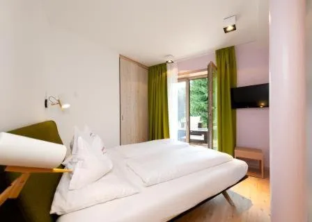 Bedroom, Bed in Familienhotel Felsenhof