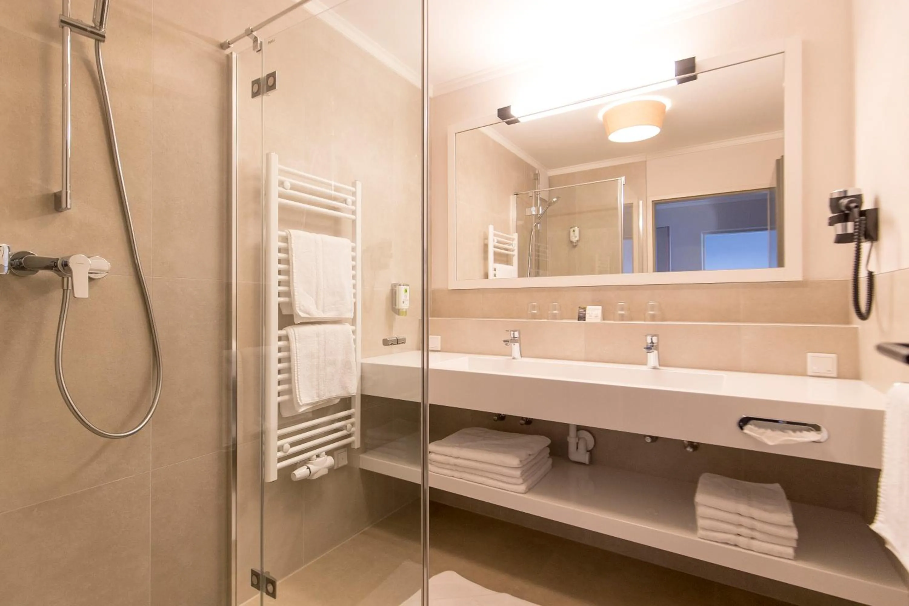 Bathroom in Familienhotel Felsenhof