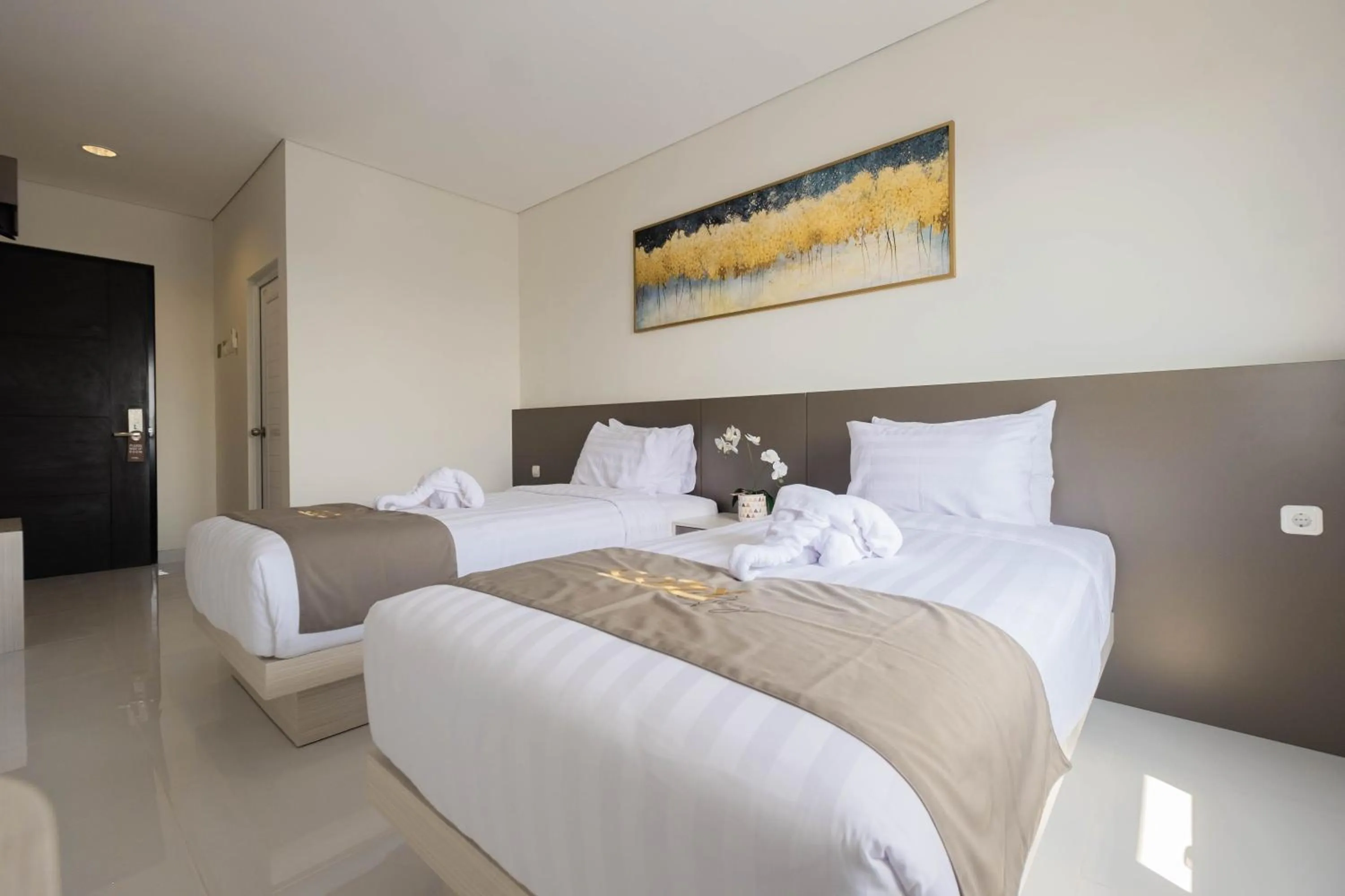 Bed in Cozzy Stay Hotel Semarang by Sinergi