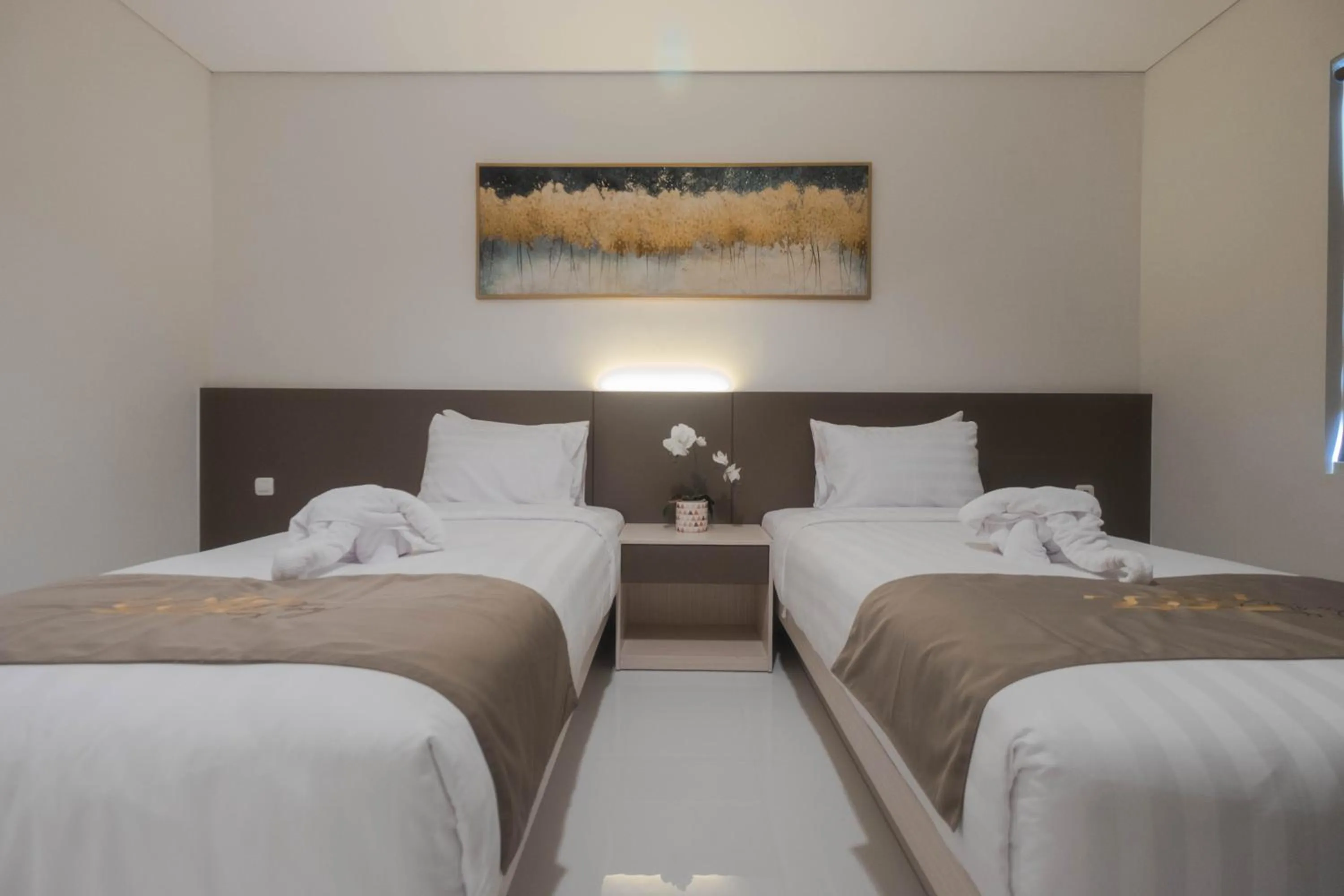 Bed in Cozzy Stay Hotel Semarang by Sinergi