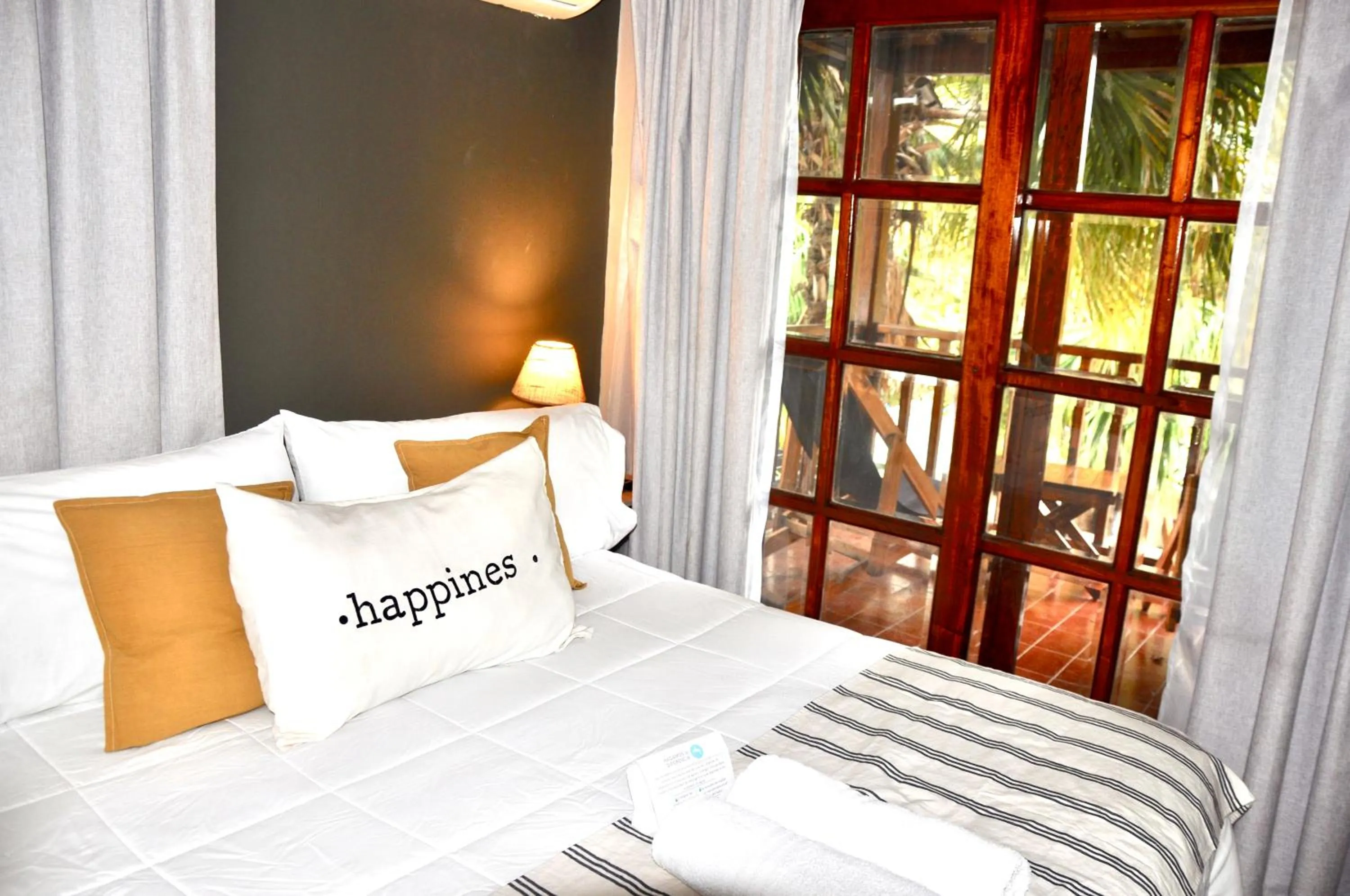 Bed in RIO TIGRE HOTEL