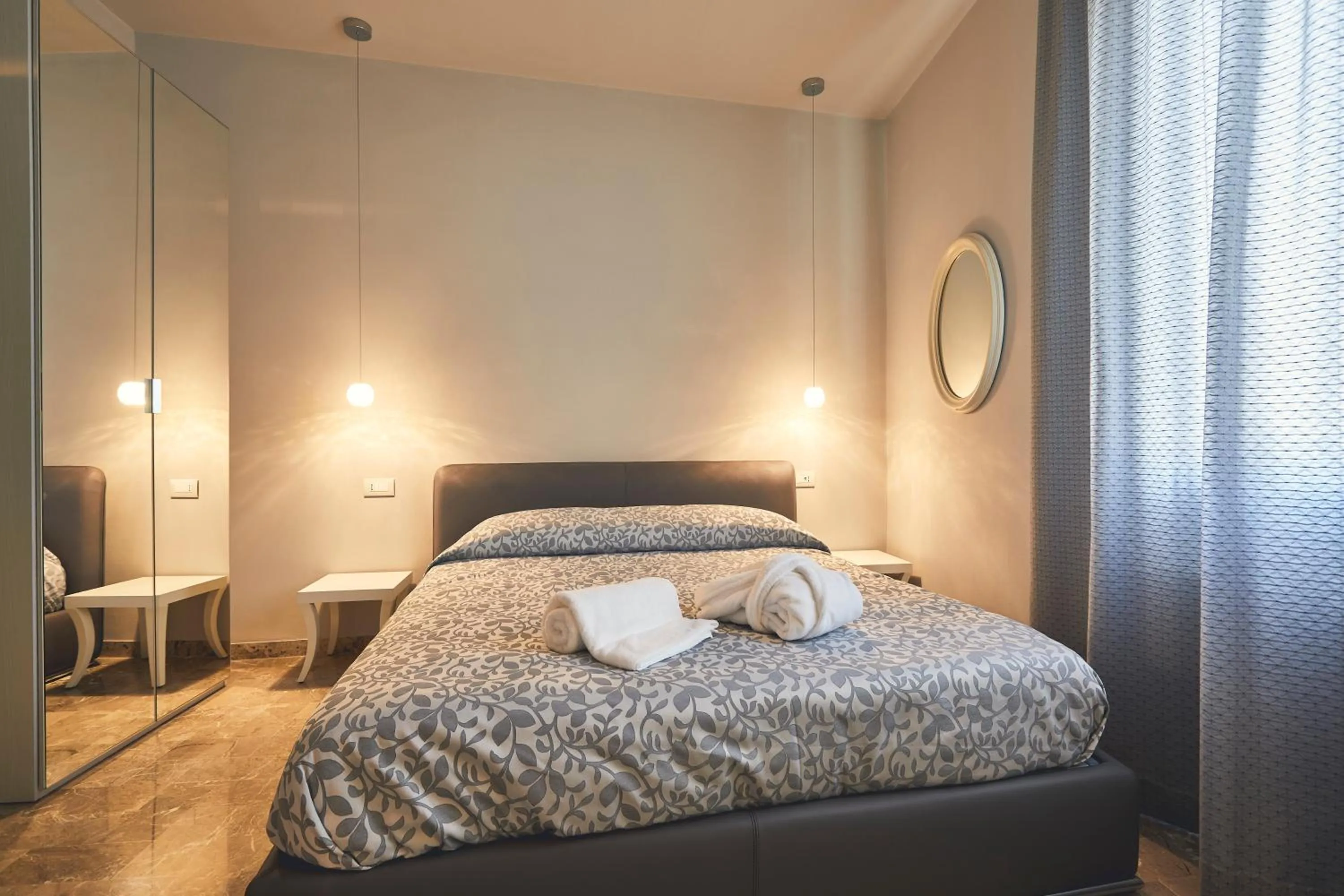 Bed in Le Stagioni Luxury Suite