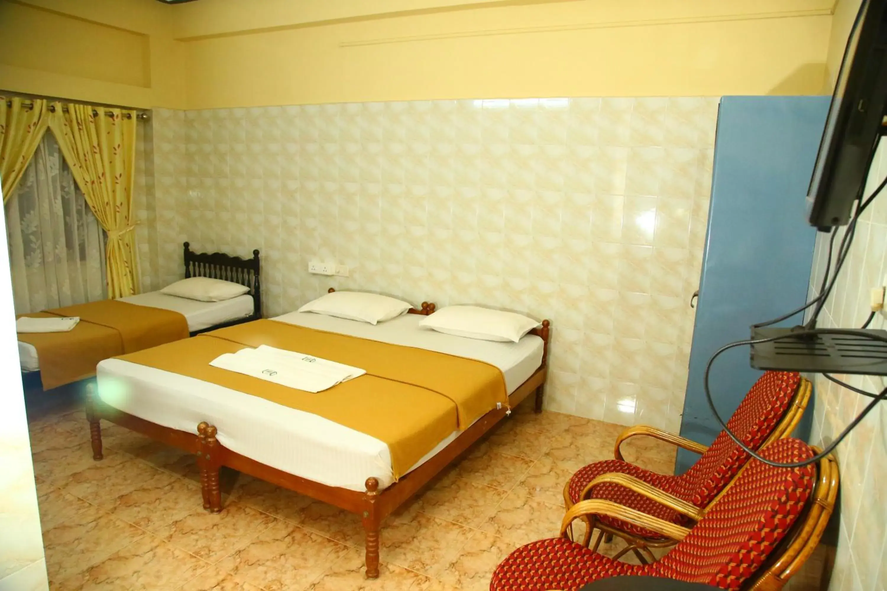 Bed in Lake Palace Family Resort Kumarakom Bed in Lake Palace Family Resort Kumarakom