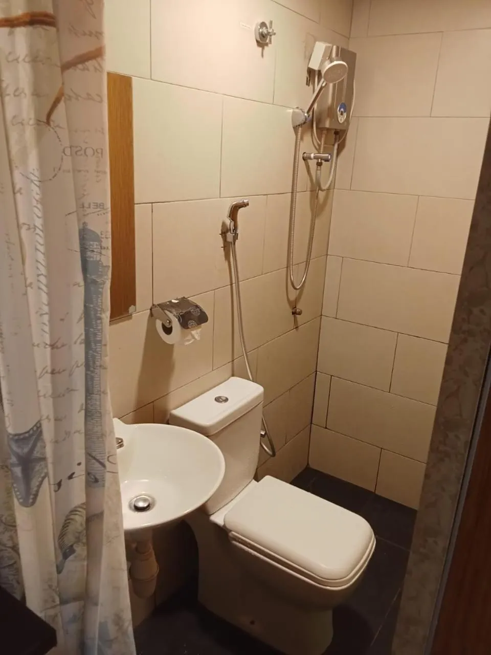 Bathroom in 33 Star Hotel by The Awinka Group Of Management