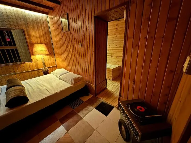 Bed in BioHotel Ecohouse