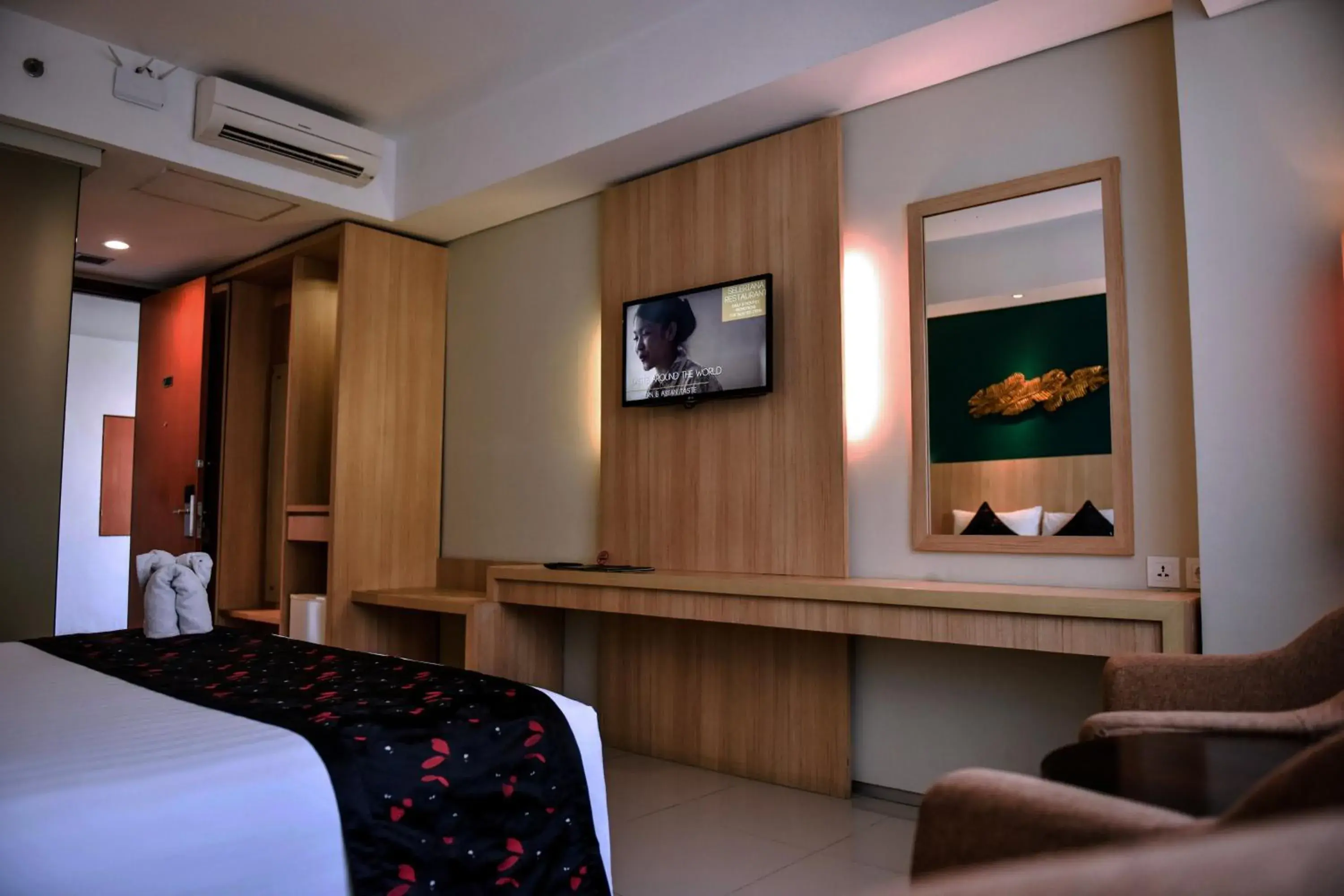 Bed in The Kana Kuta Hotel Bed in The Kana Kuta Hotel