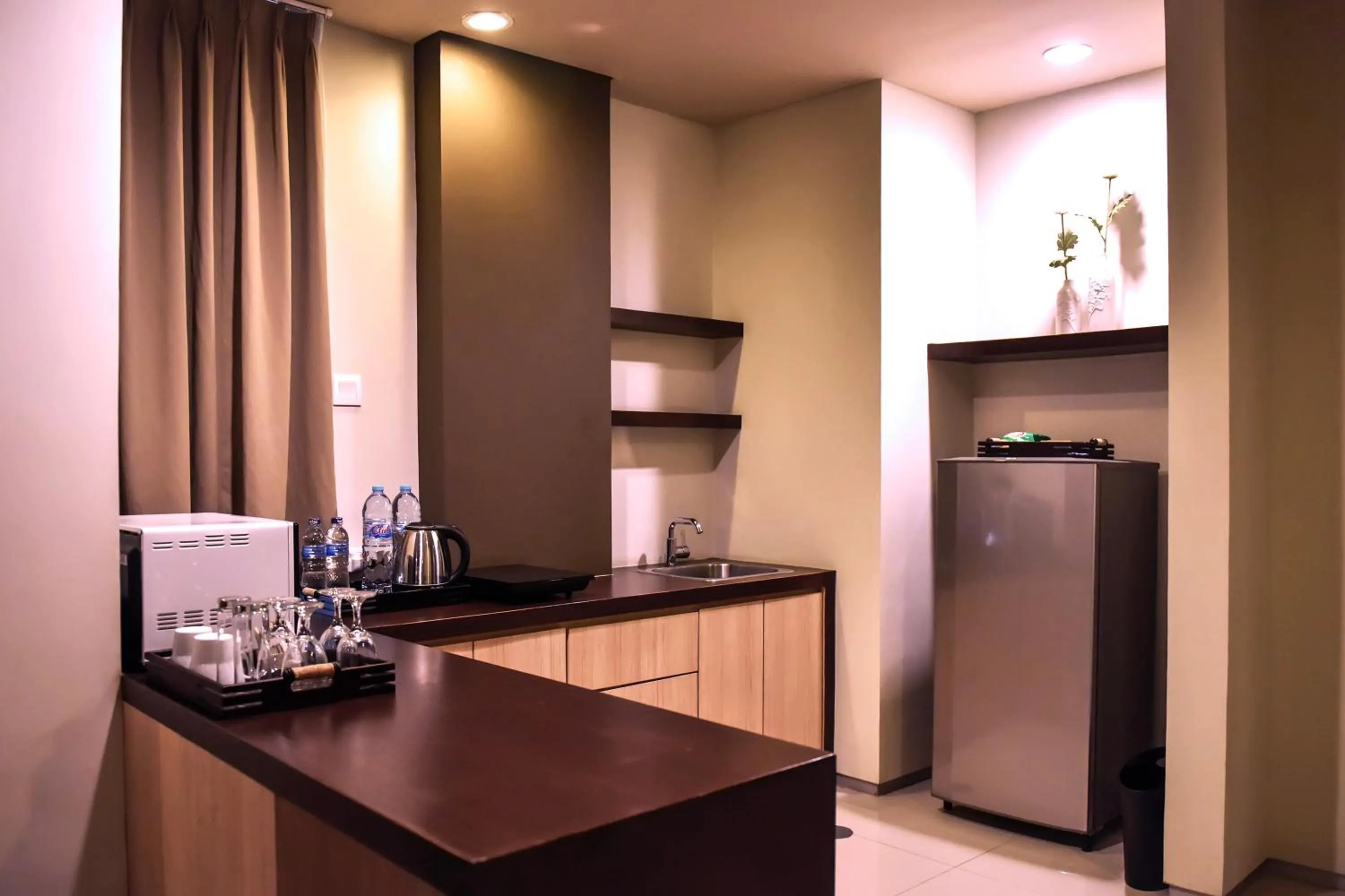 Kitchen or kitchenette in The Kana Kuta Hotel