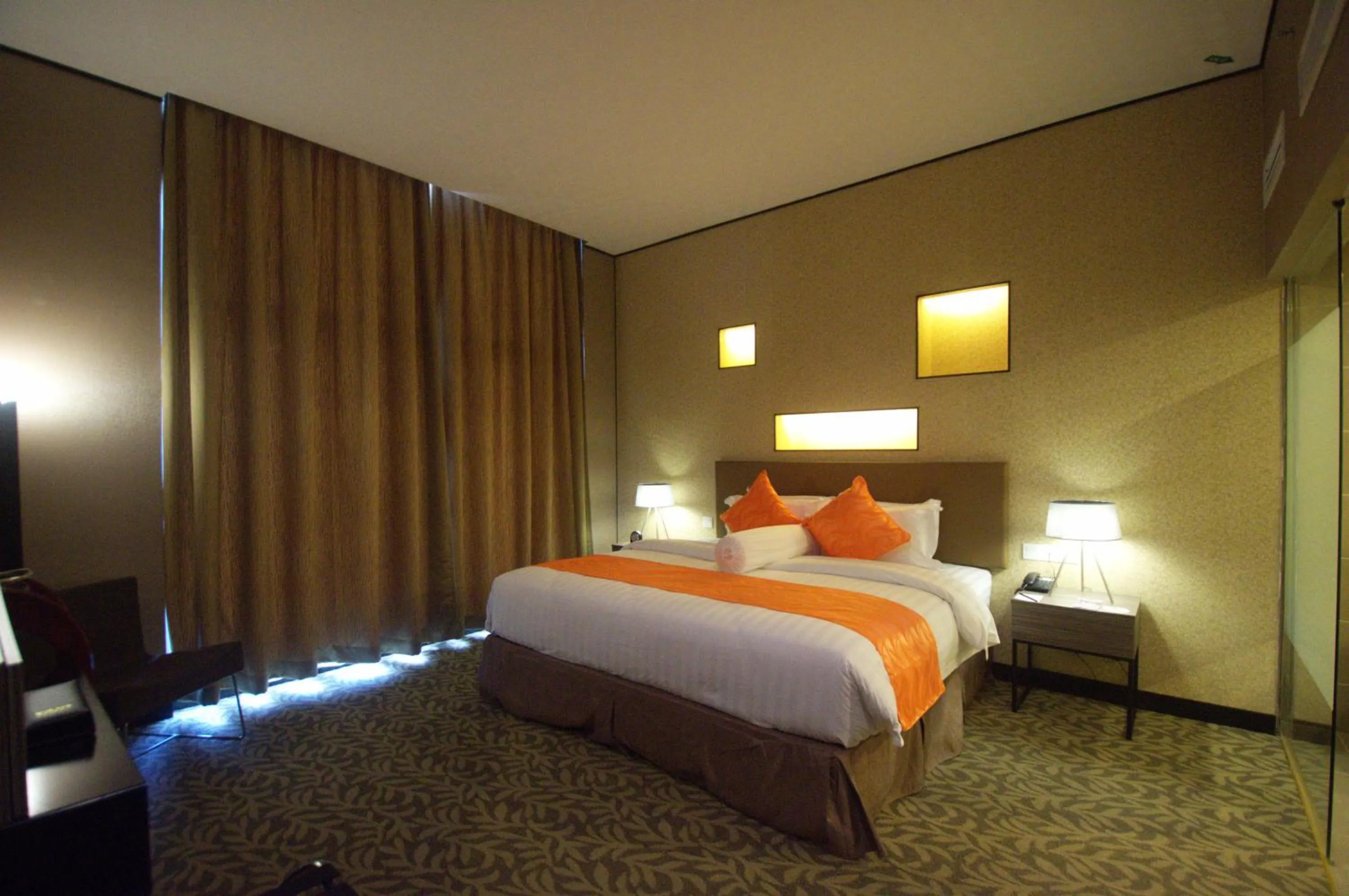 Photo of the whole room, Bed in Grand Alora Hotel