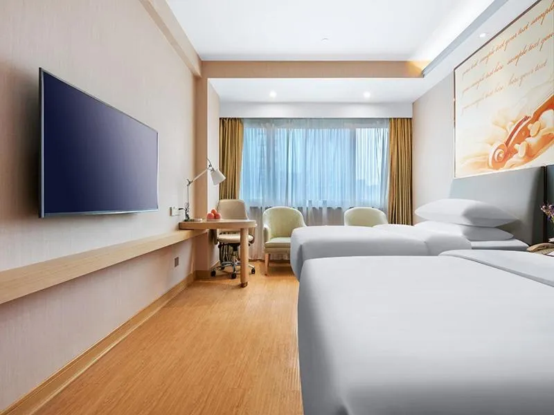 Bed in Vienna International Hotel - Hangzhou Wulin Square Branch