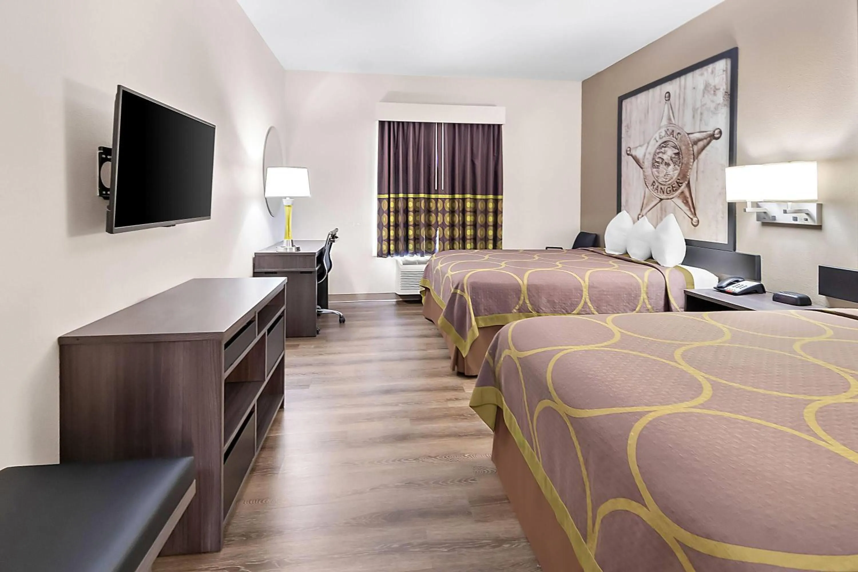 Bed in Super 8 by Wyndham Fort Worth Stockyards