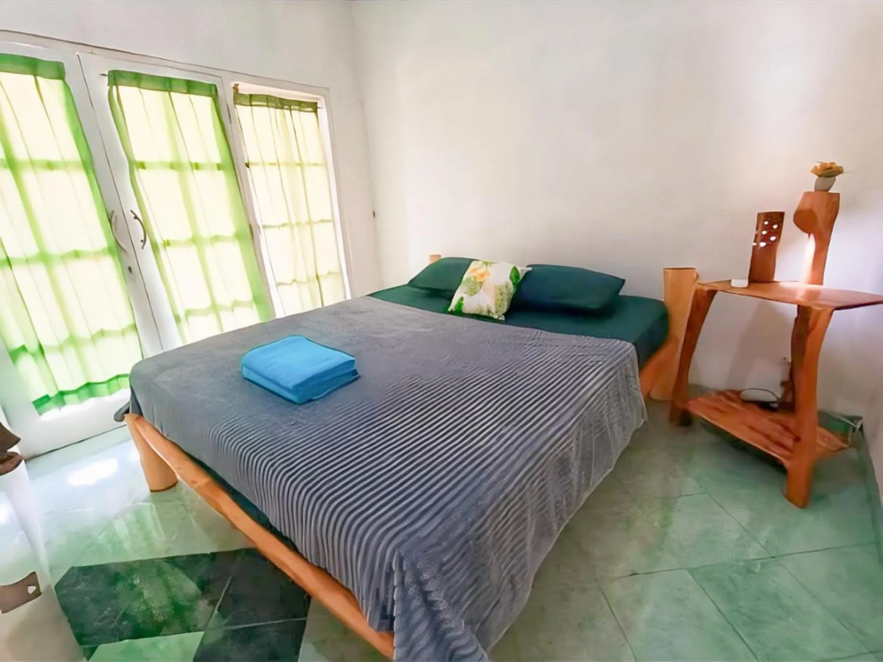 Bed in BILIK BAMBOO HOMESTAY