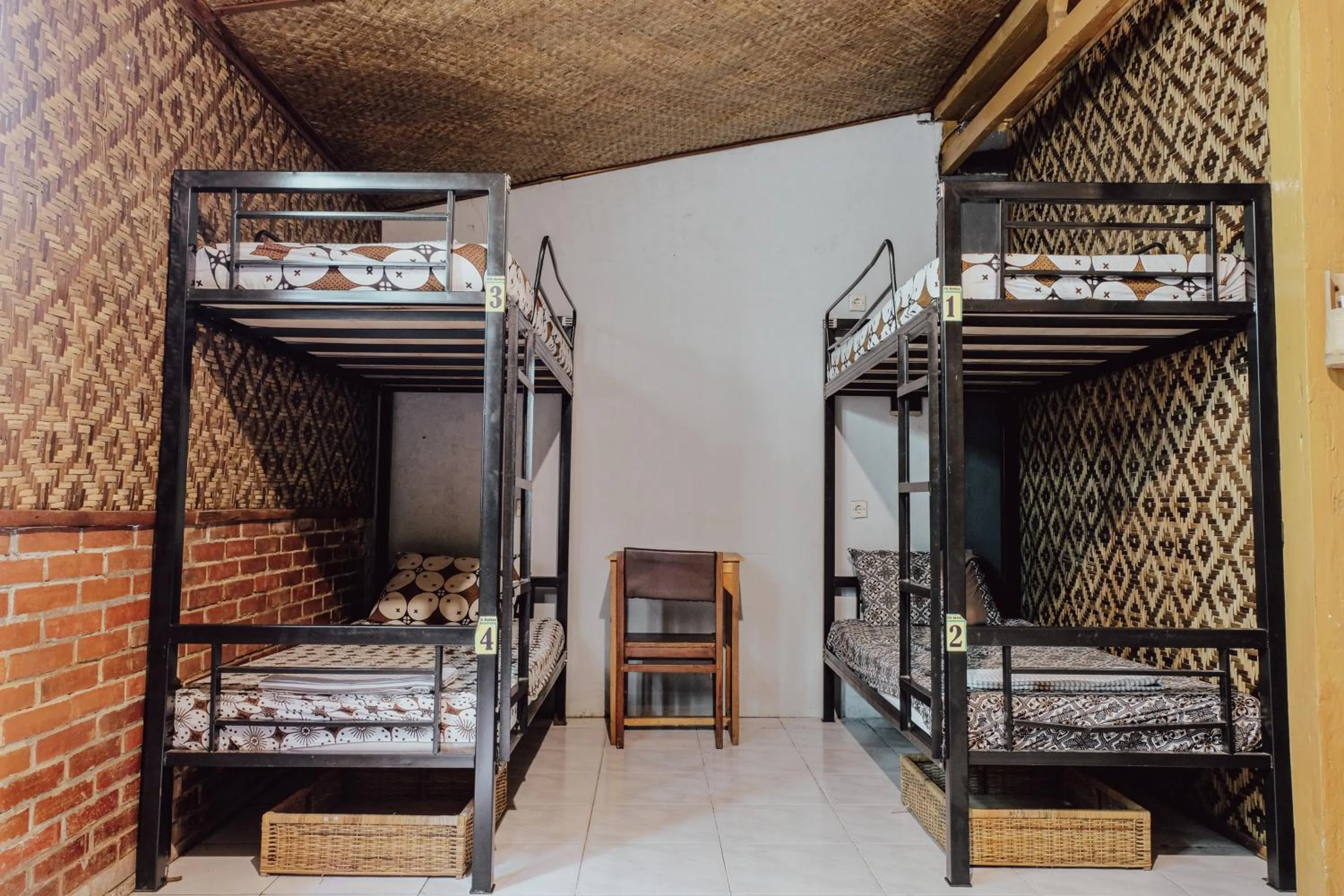 Bed in BILIK BAMBOO HOMESTAY