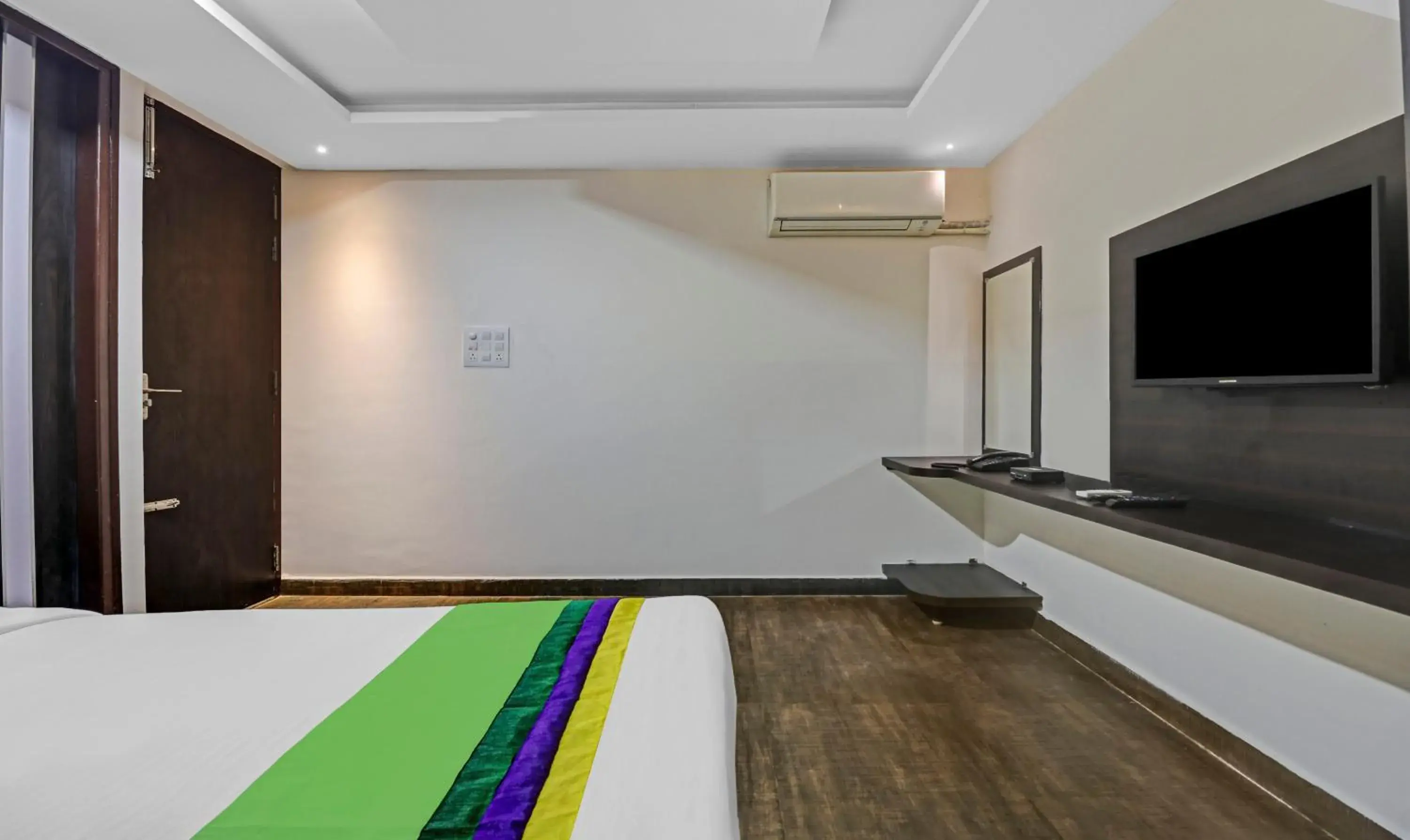 Bed in Treebo JJ Residency Bed in Treebo JJ Residency