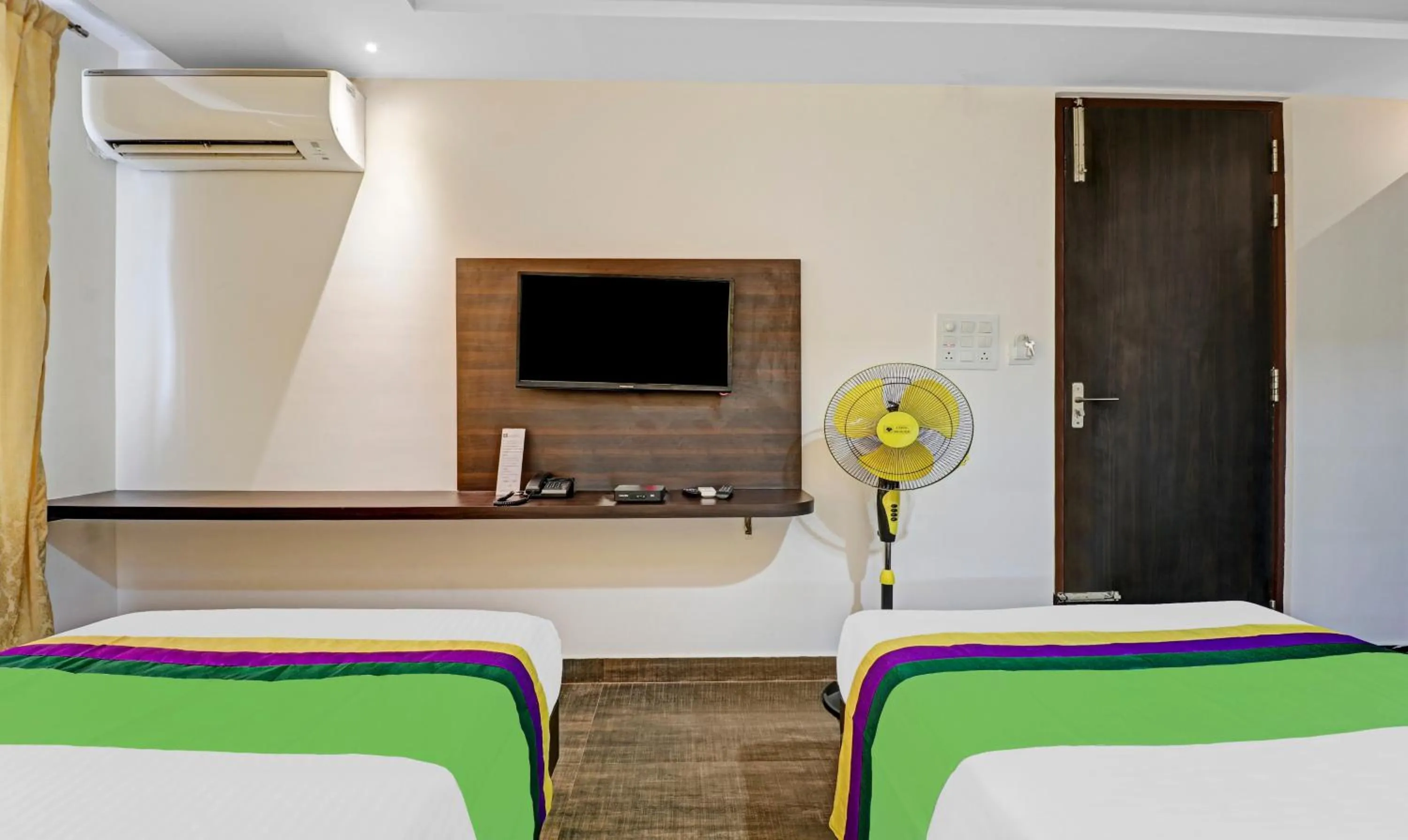 Bed in Treebo JJ Residency