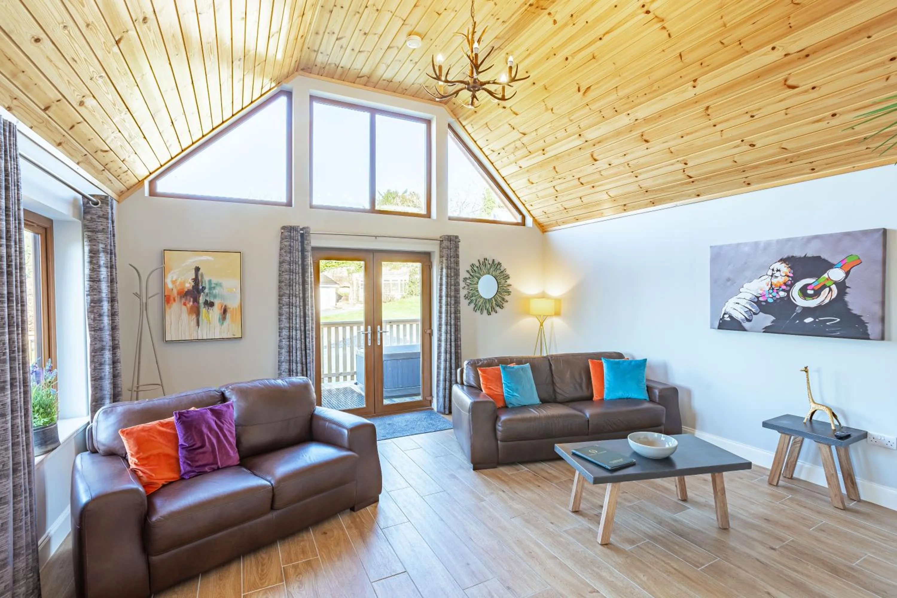 Living room in Kestrel Lodge 7 with Hot Tub