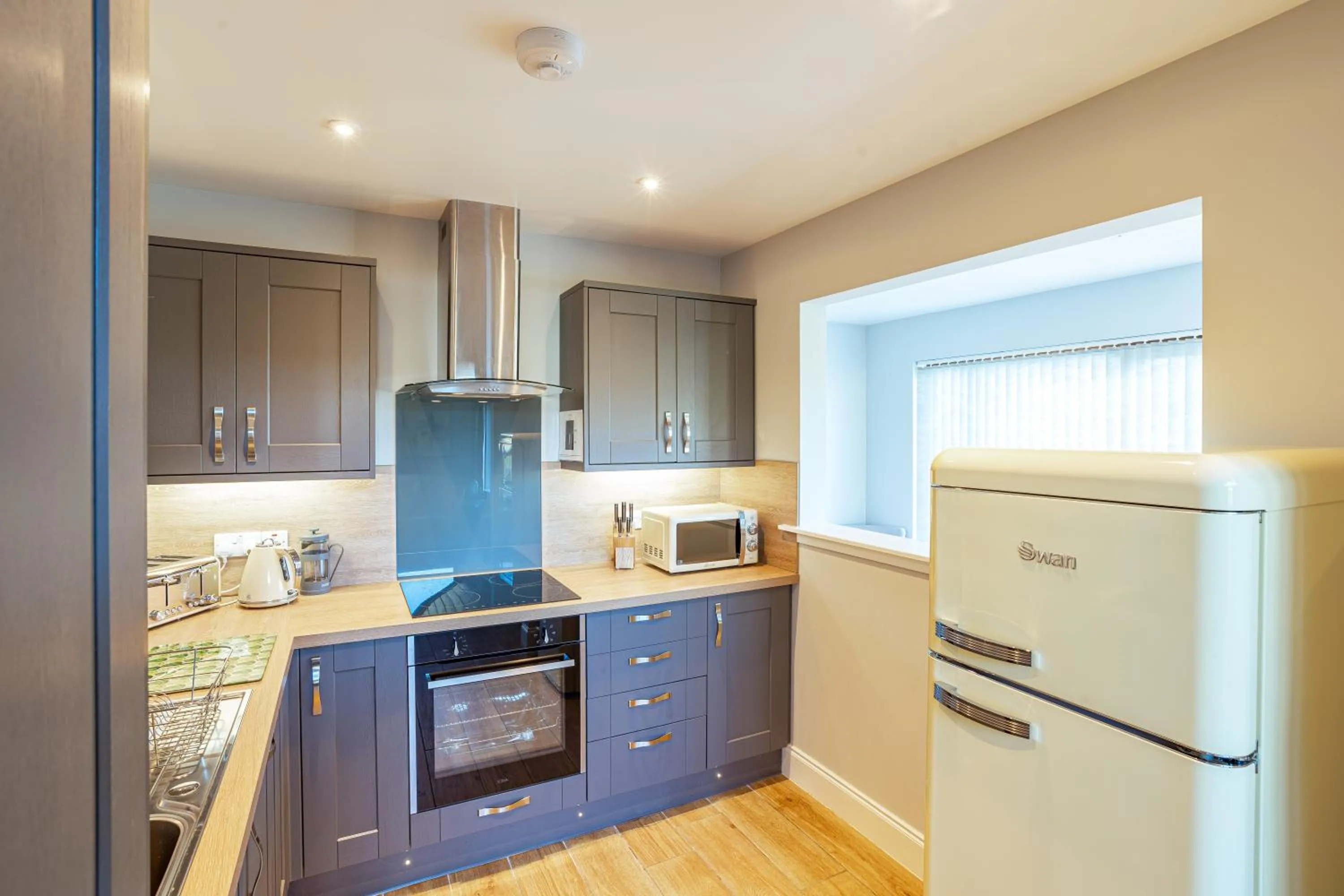 Kitchen or kitchenette in Kestrel Lodge 7 with Hot Tub