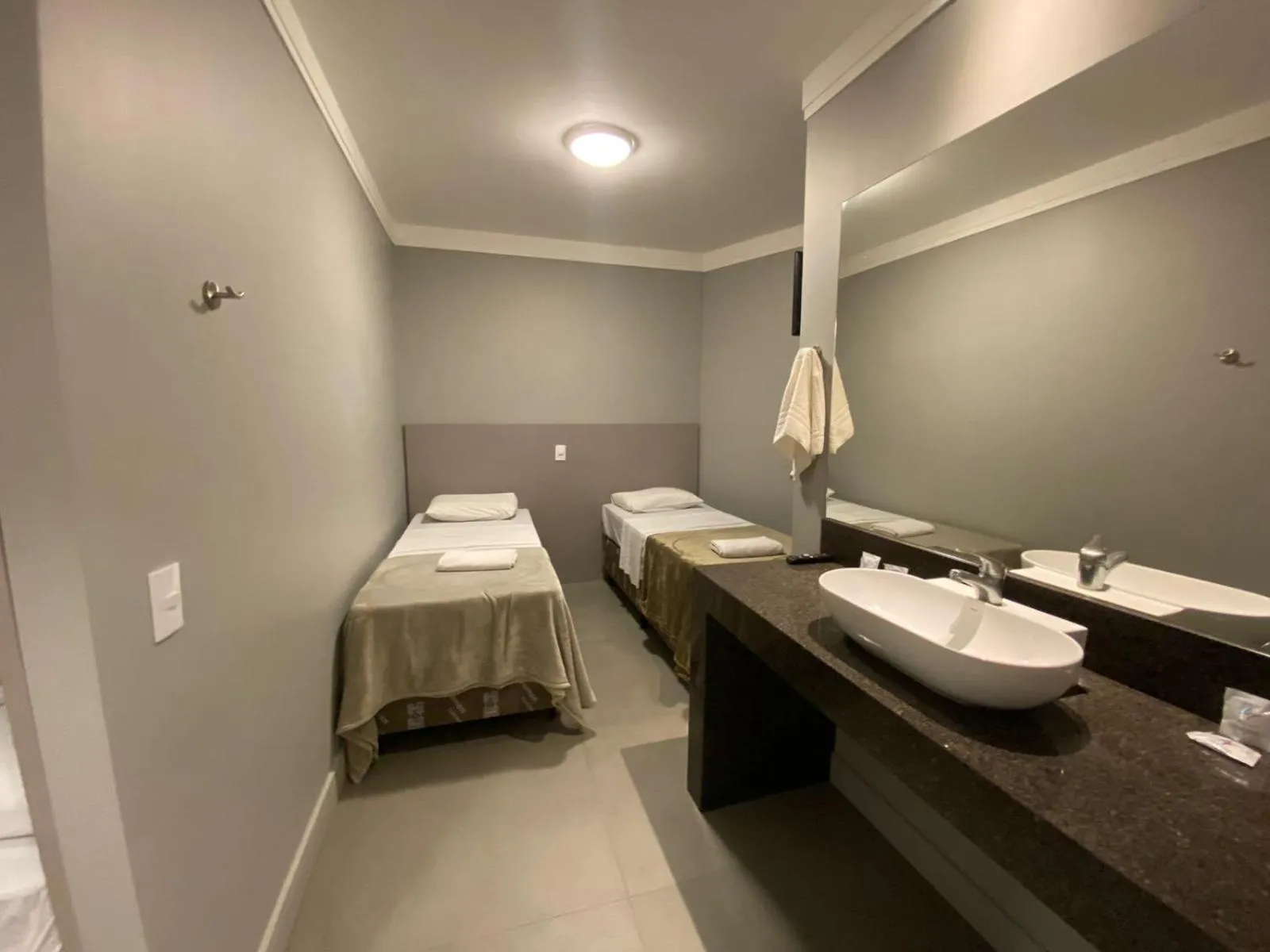 Photo of the whole room, Bed in Hotel PrimeInn