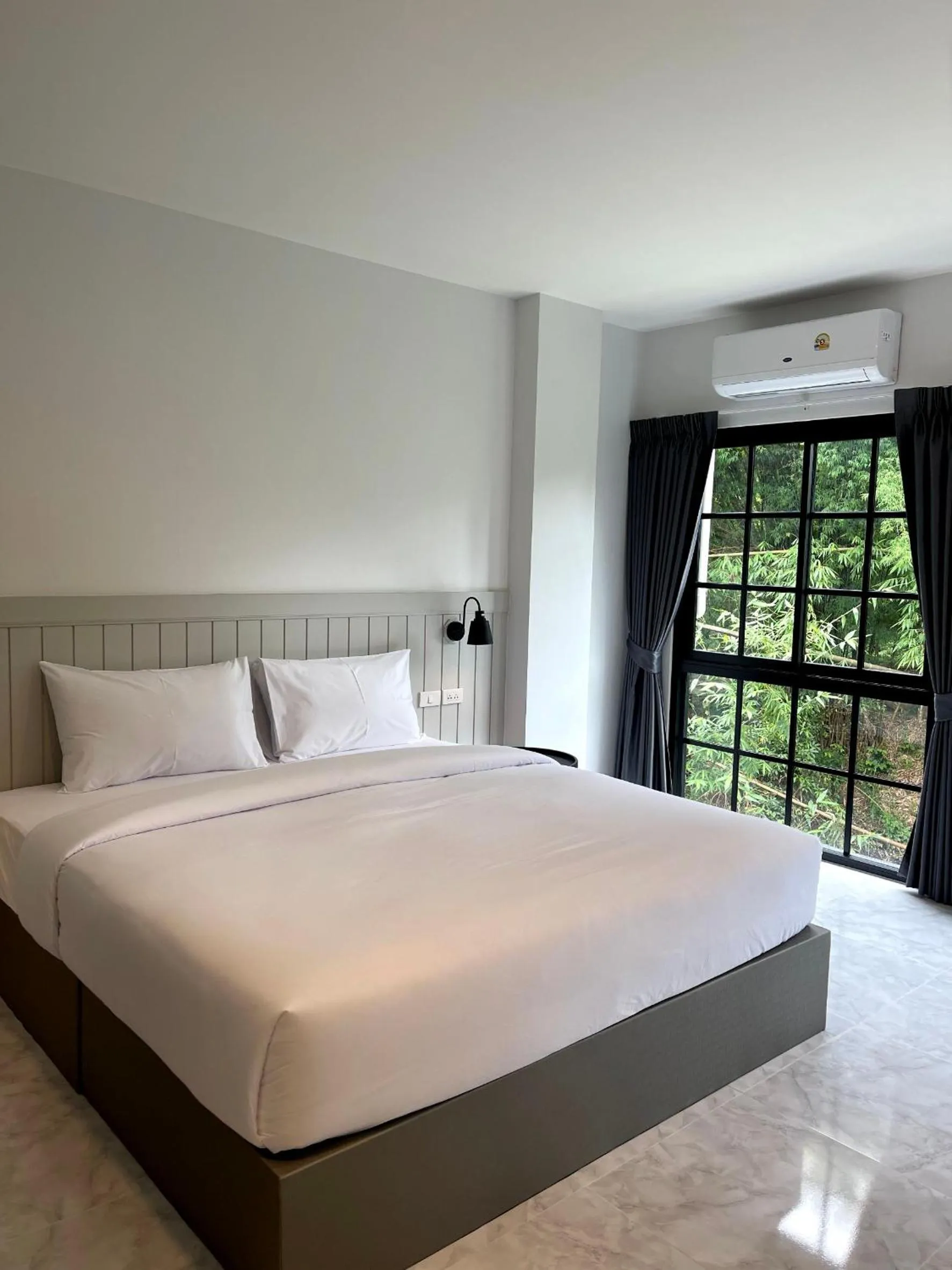 Bed in The Target Hotel chaingrai