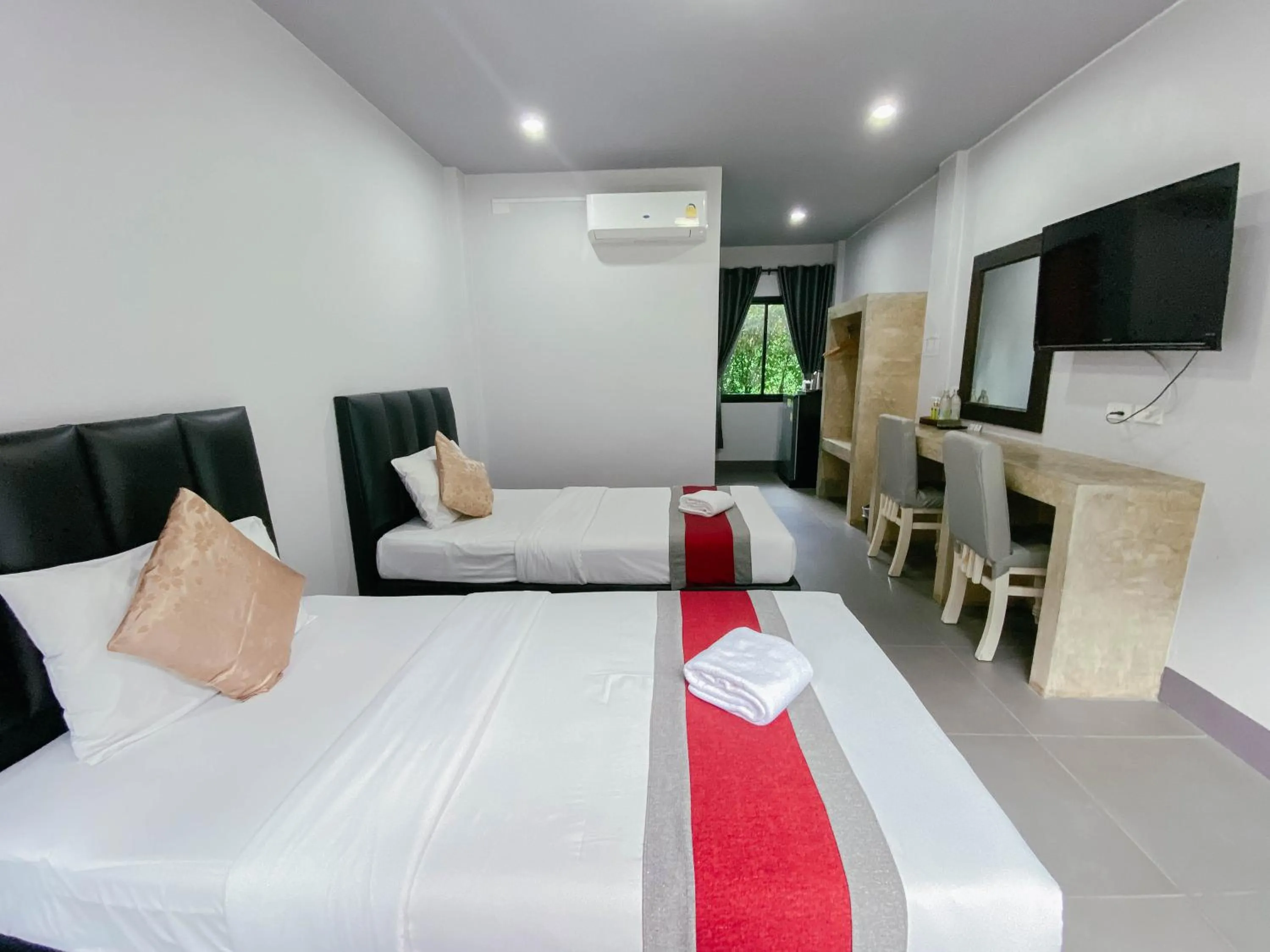 Bed in The Target Hotel chaingrai