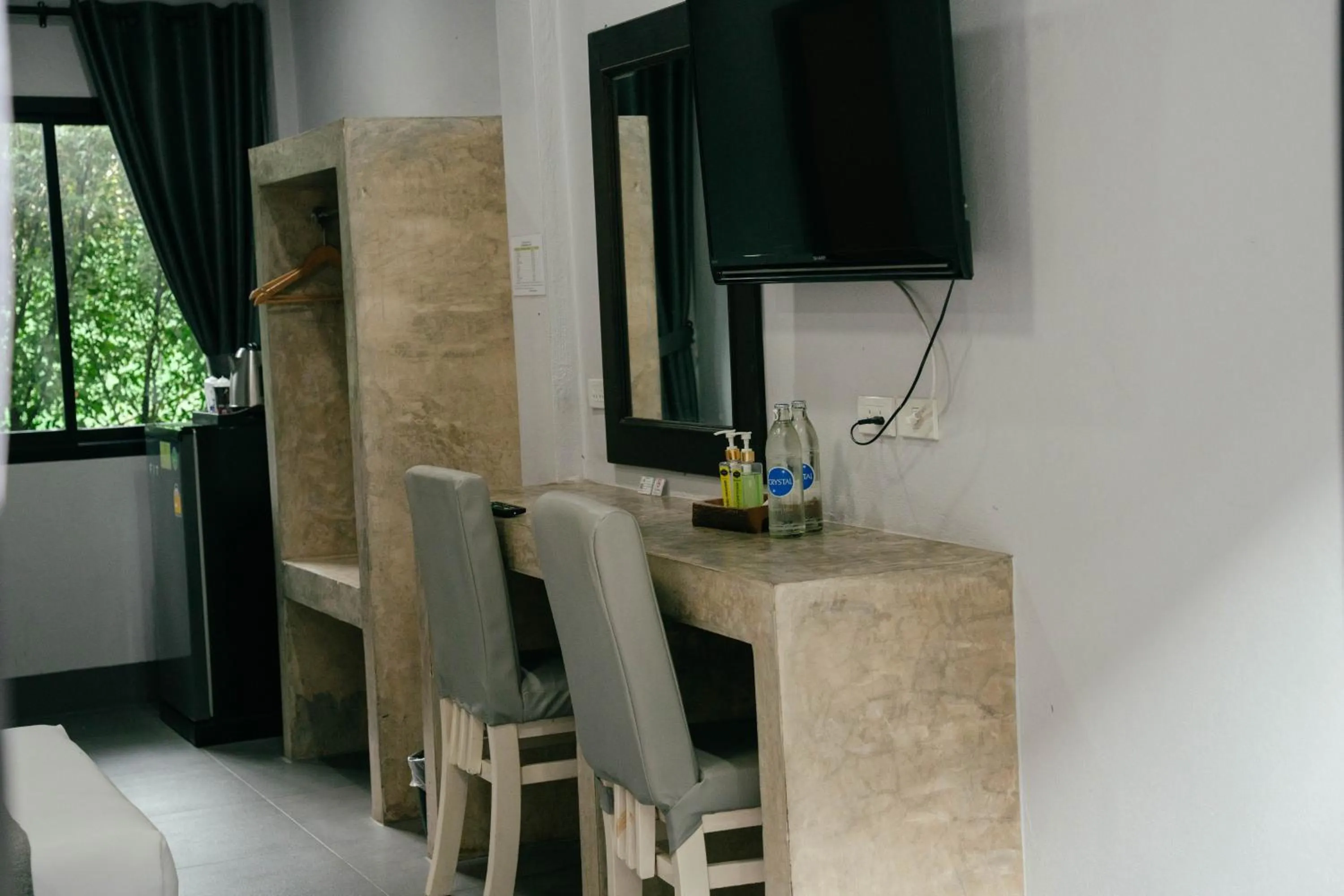 TV and multimedia in The Target Hotel chaingrai