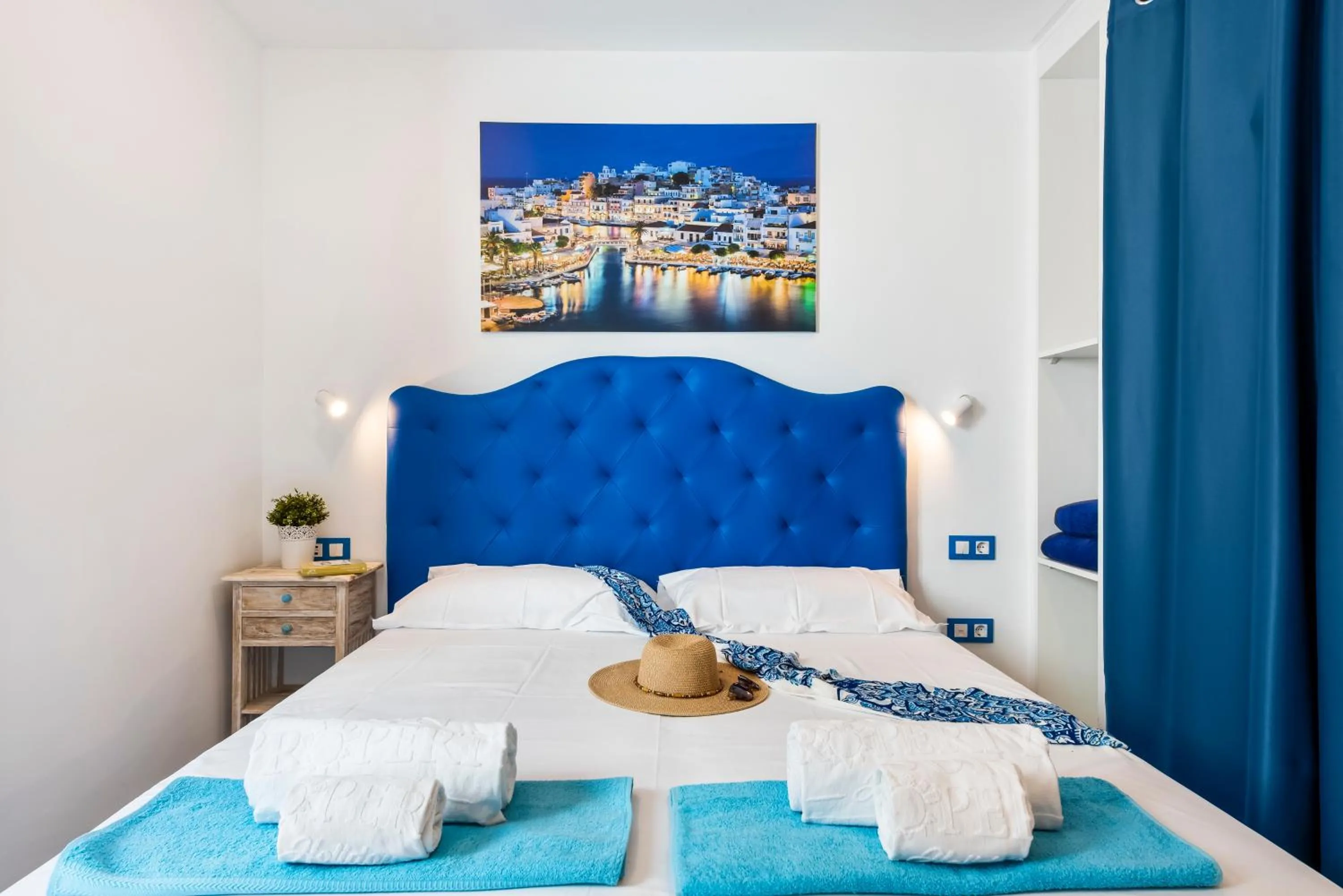 Bed in OKEANOS Eco Guest House