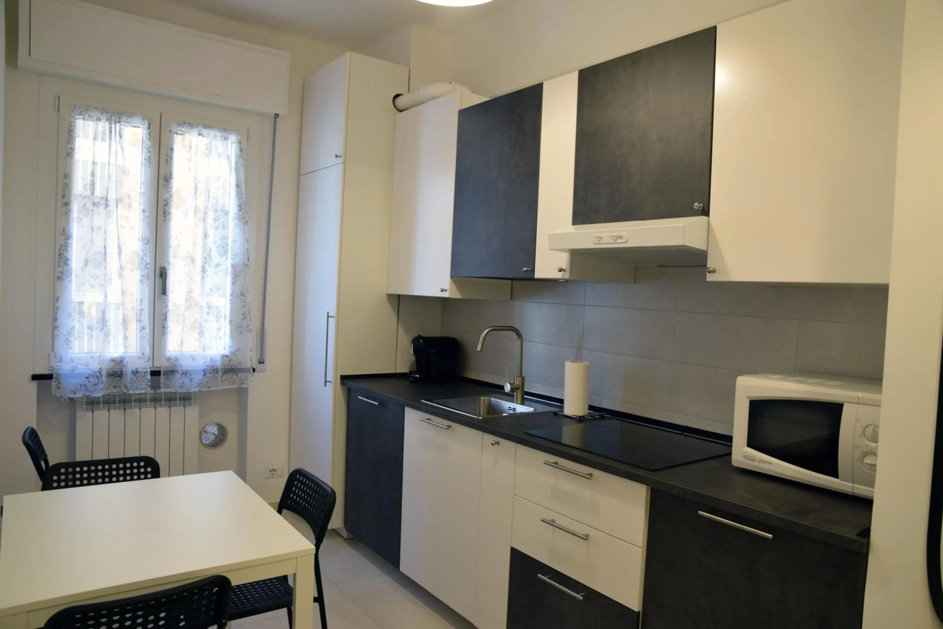 Kitchen or kitchenette in Sunrise Apartment