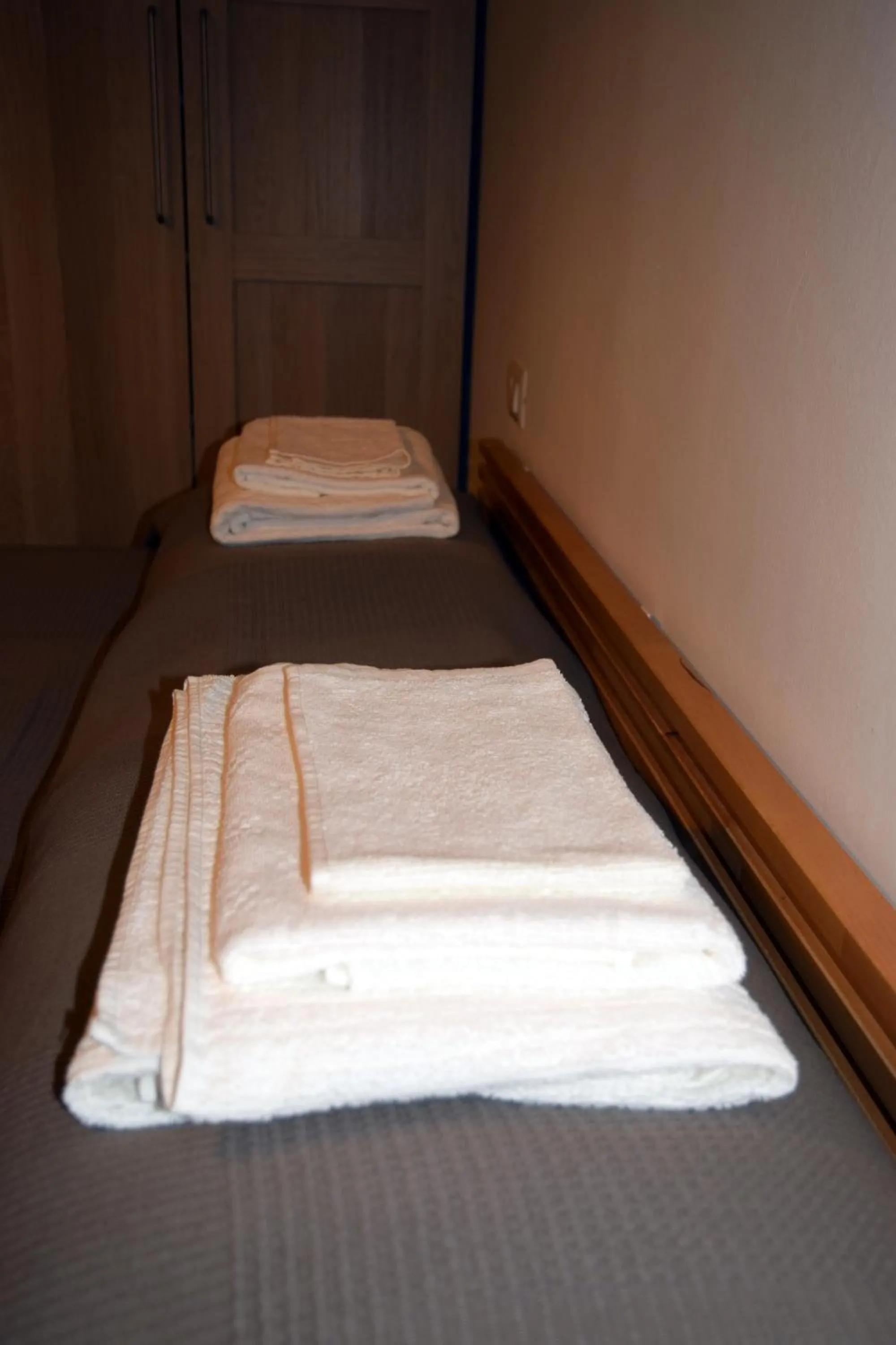 Bed in Sunrise Apartment