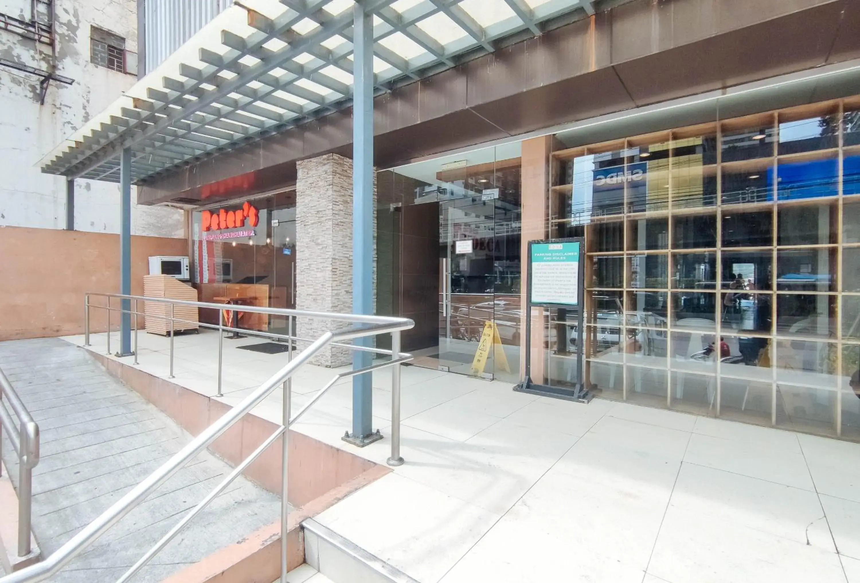 Facade/entrance in Eimy's Place at Urban Deca Mandaluyong by RedDoorz Facade/entrance in Eimy's Place at Urban Deca Mandaluyong by RedDoorz