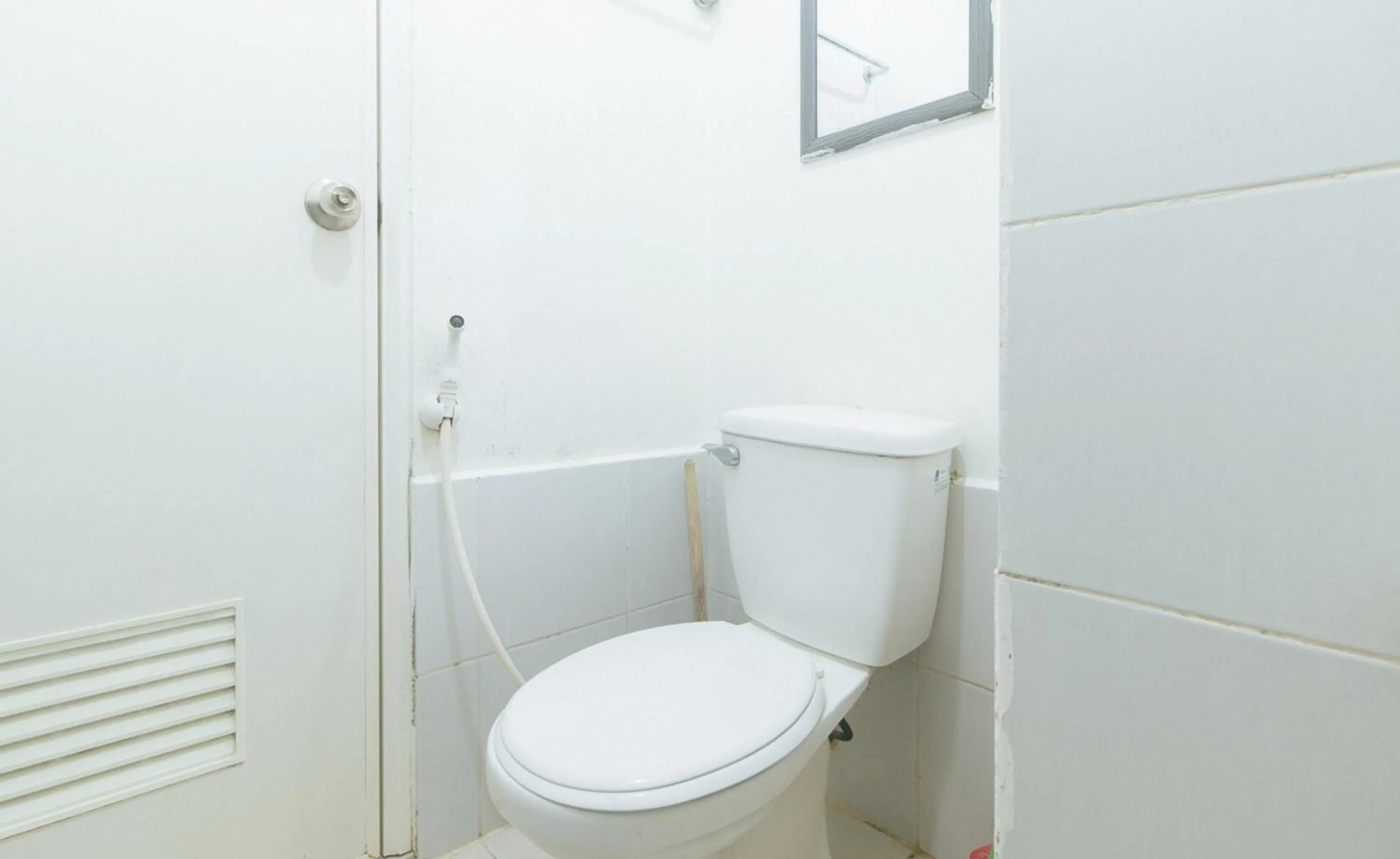 Toilet in Eimy's Place at Urban Deca Mandaluyong by RedDoorz