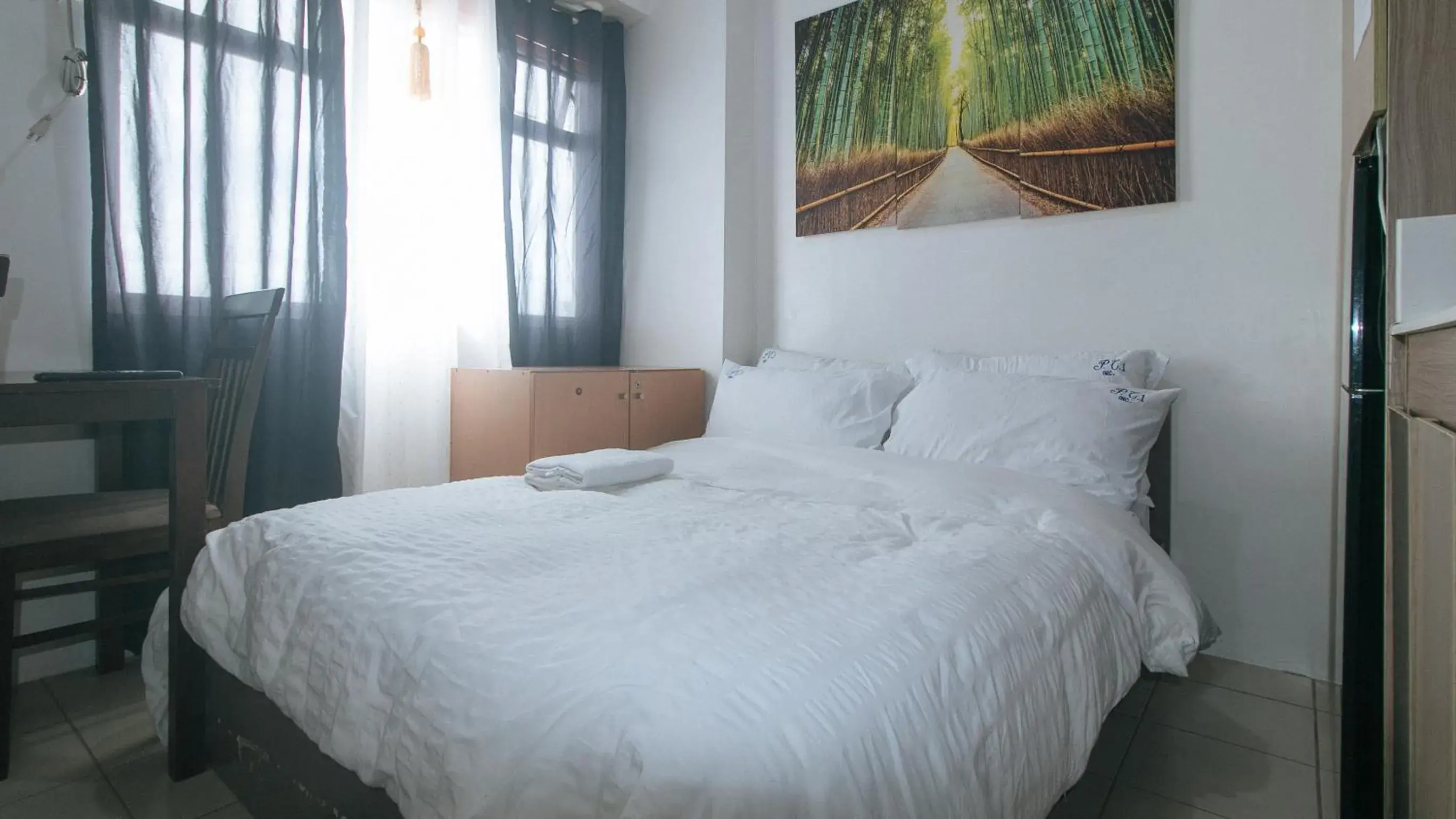 Bed in Eimy's Place at Urban Deca Mandaluyong by RedDoorz Bed in Eimy's Place at Urban Deca Mandaluyong by RedDoorz