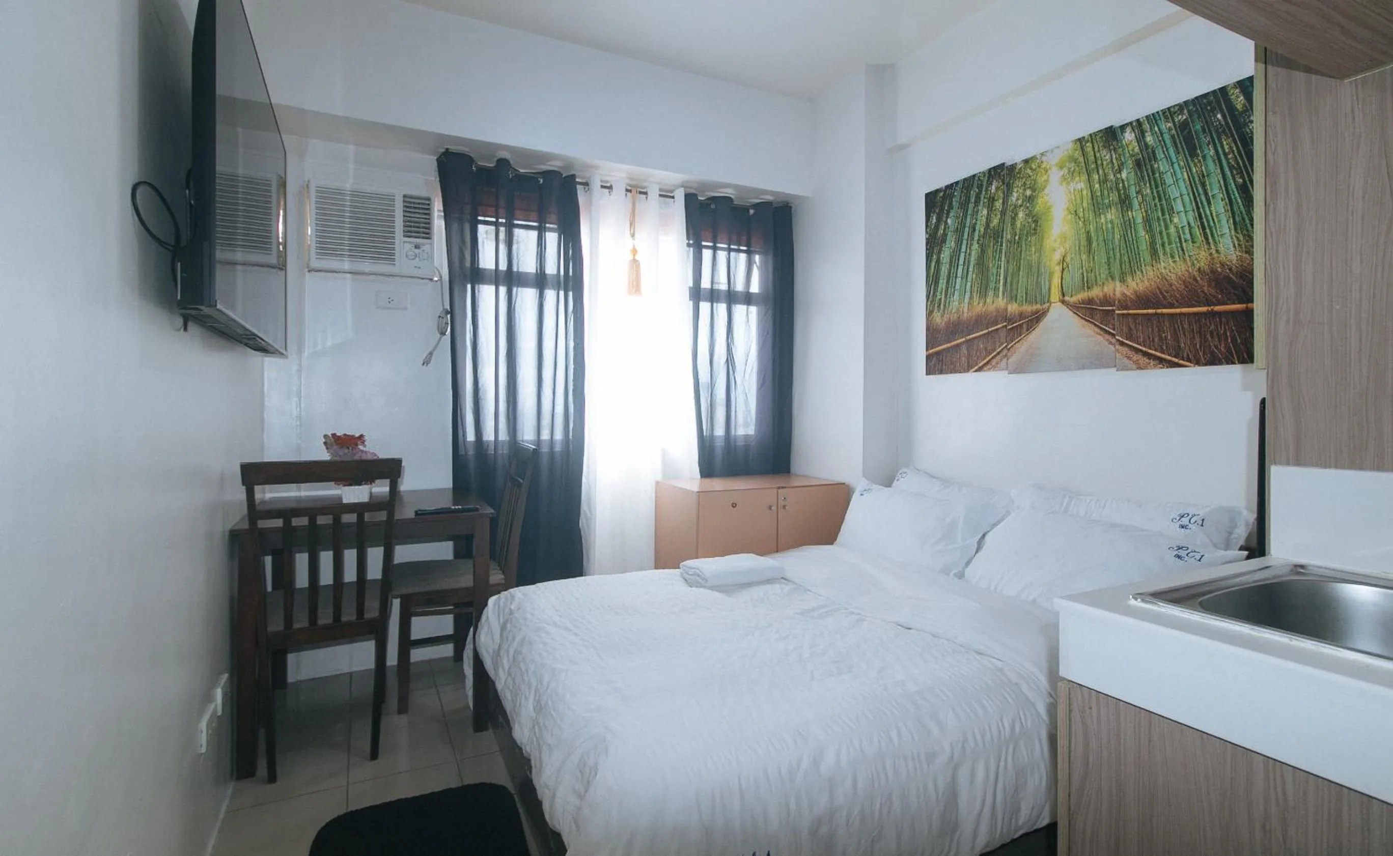 Bed in Eimy's Place at Urban Deca Mandaluyong by RedDoorz