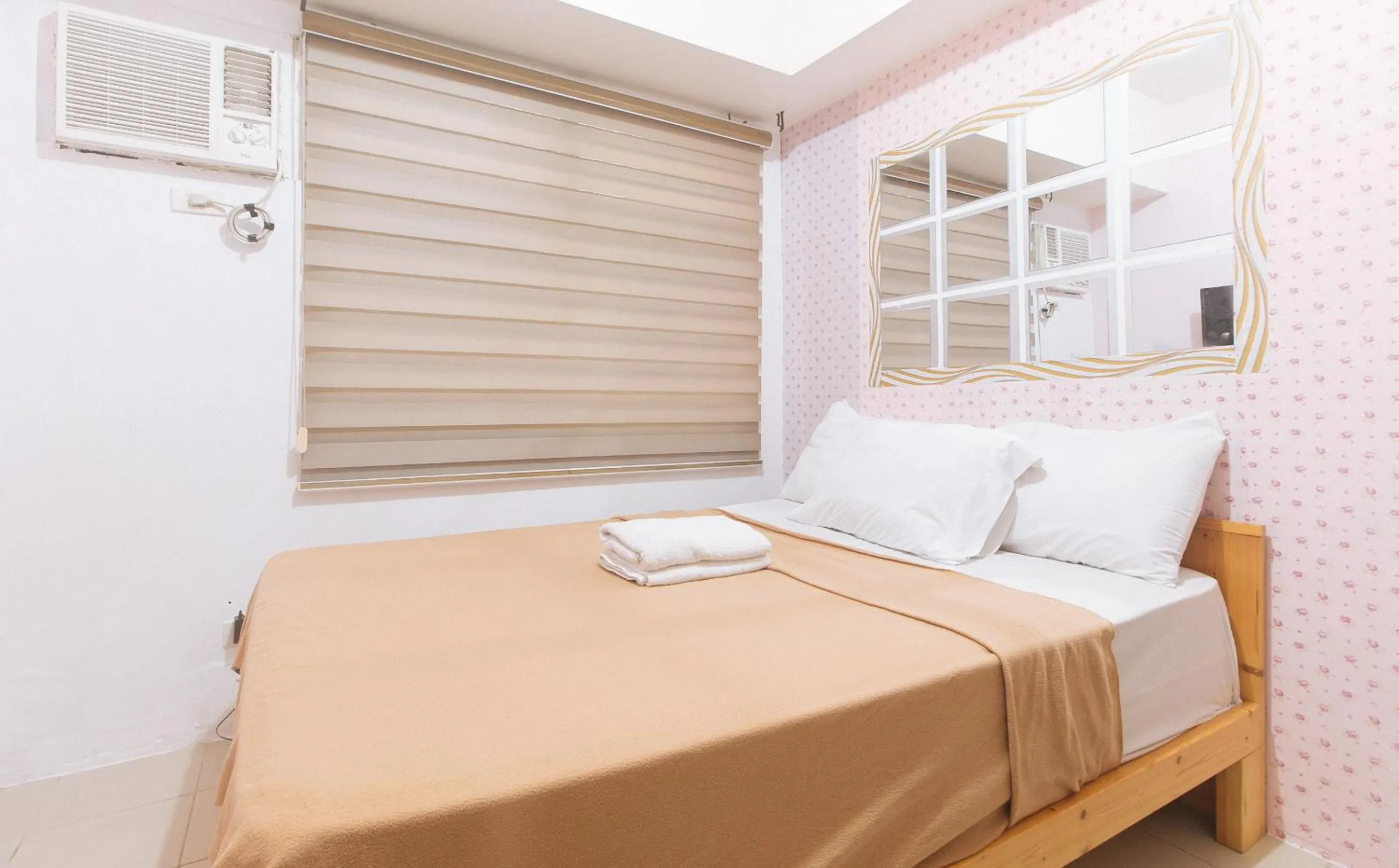 Bed in Eimy's Place at Urban Deca Mandaluyong by RedDoorz