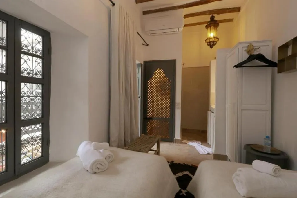 Bed in Riad 103 Medina Pool and Hammam