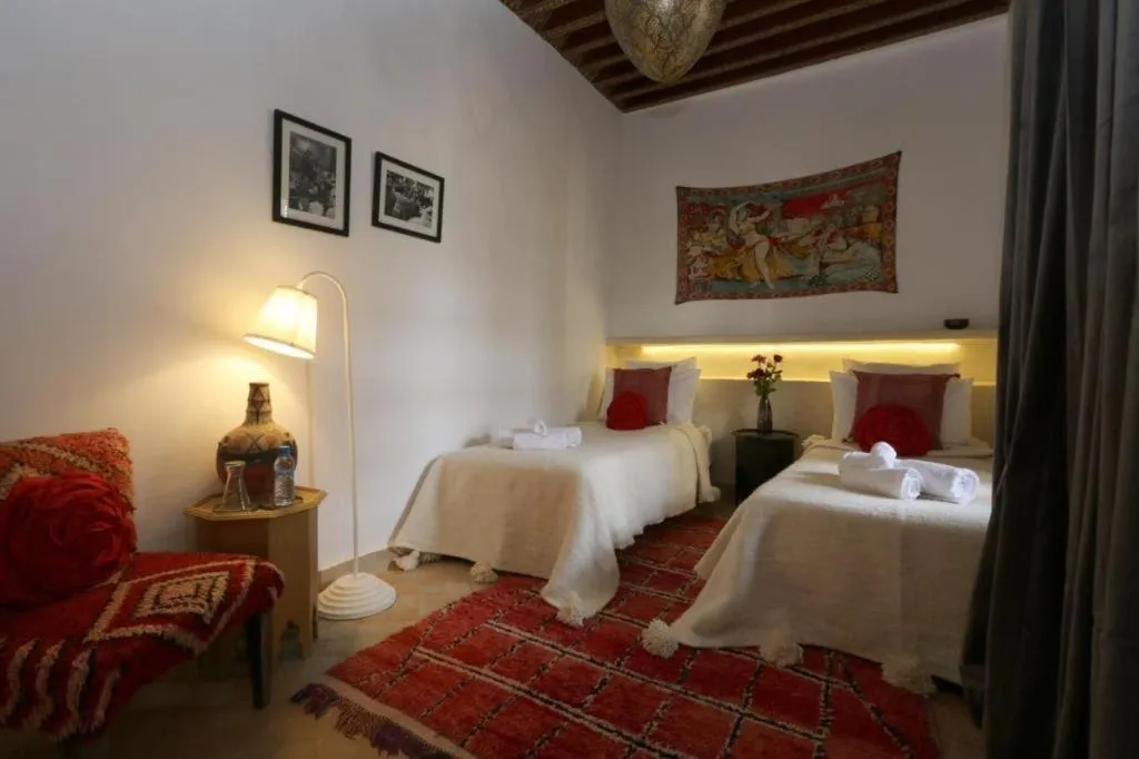 Bed in Riad 103 Medina Pool and Hammam