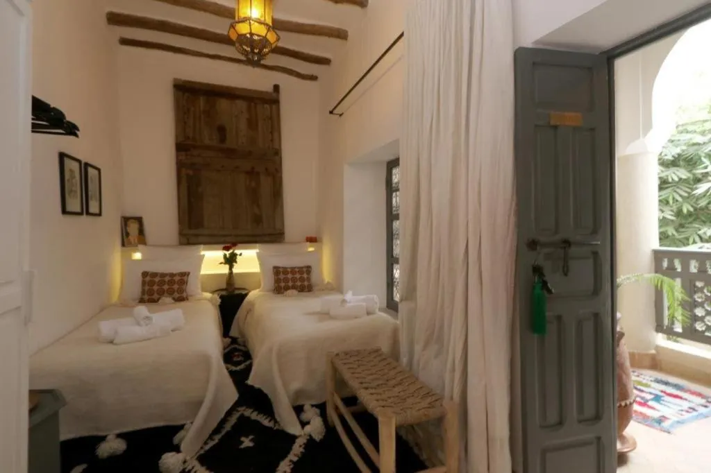 Bed in Riad 103 Medina Pool and Hammam