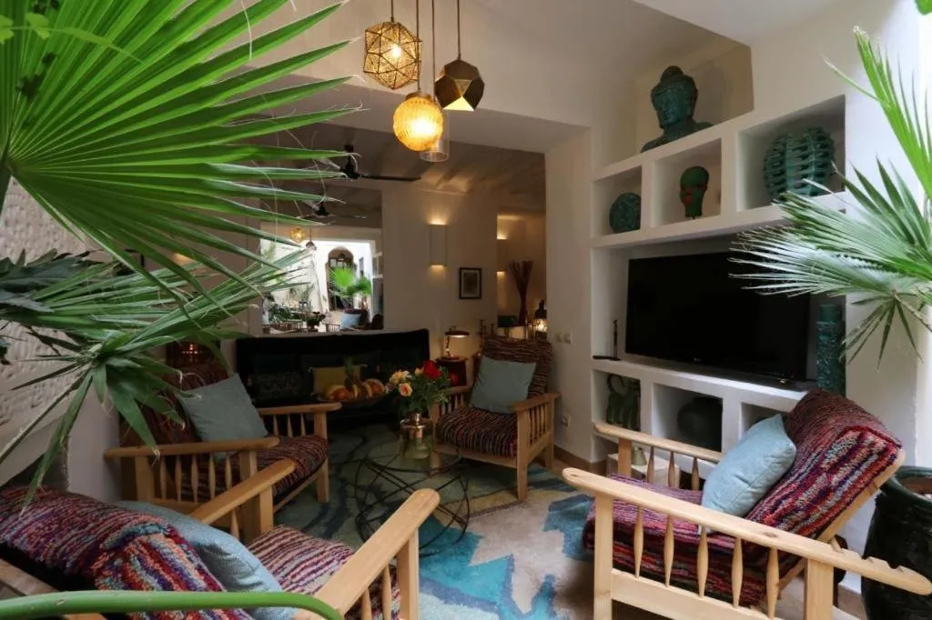 Communal lounge/ TV room in Riad 103 Medina Pool and Hammam