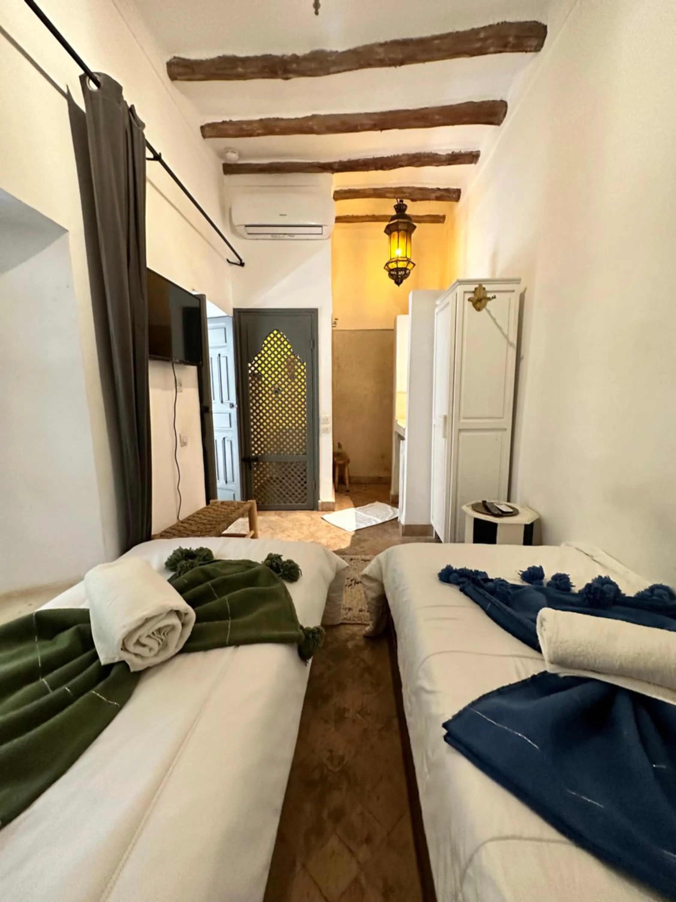 Bed in Riad 103 Medina Pool and Hammam